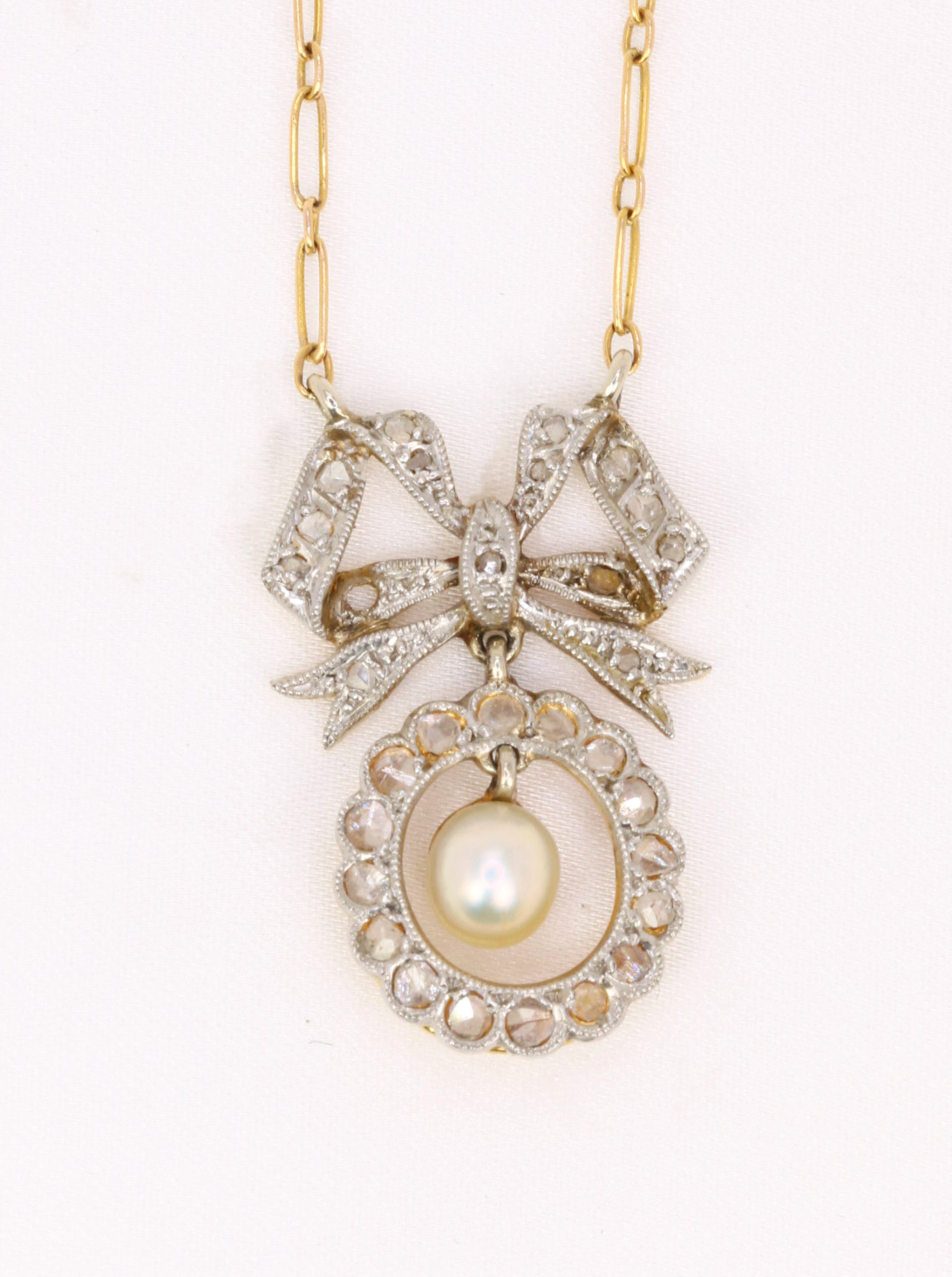 Collier noeud Belle Epoque or diamants perle fine