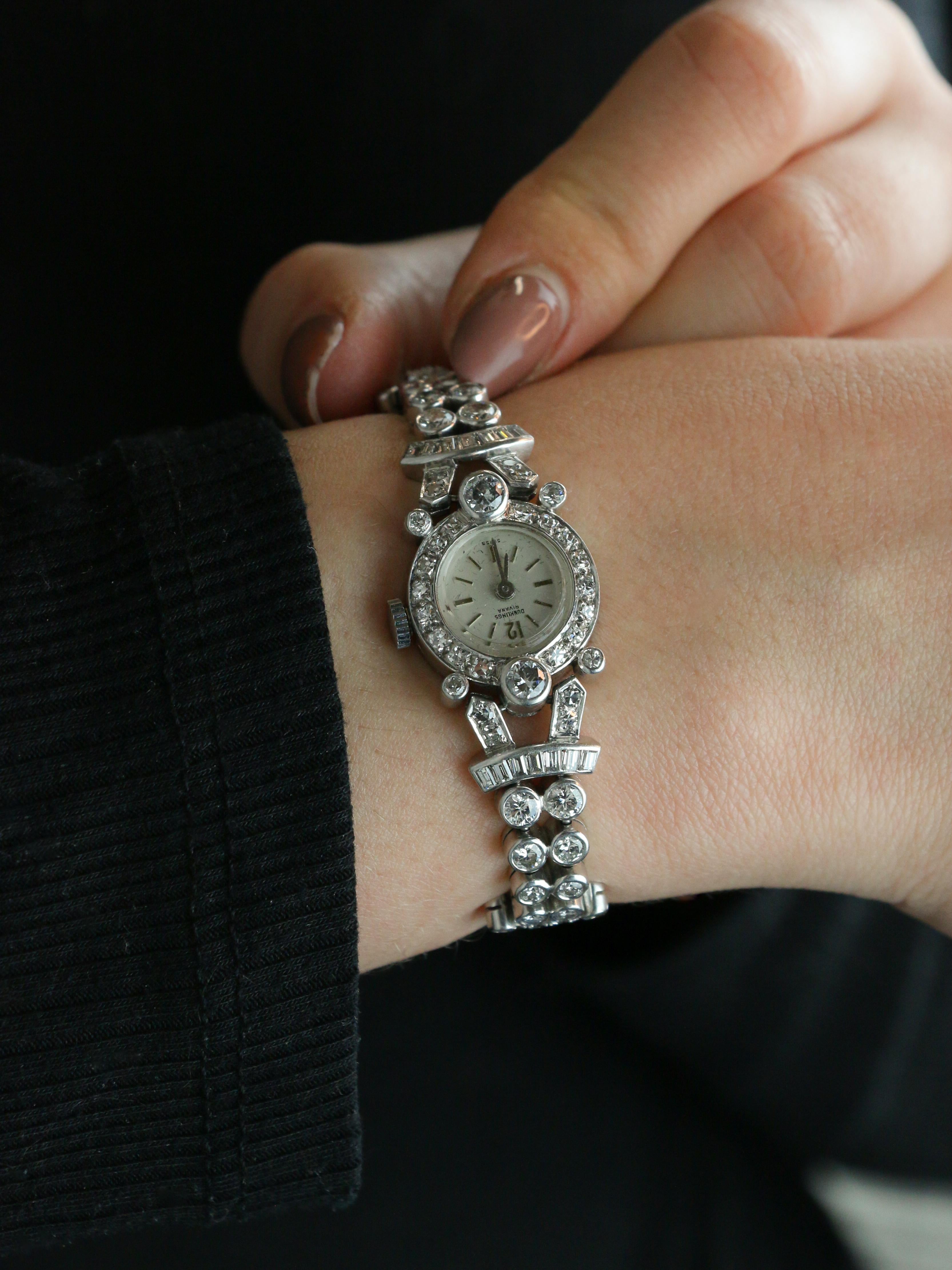 Montre Art Deco or blanc platine diamants