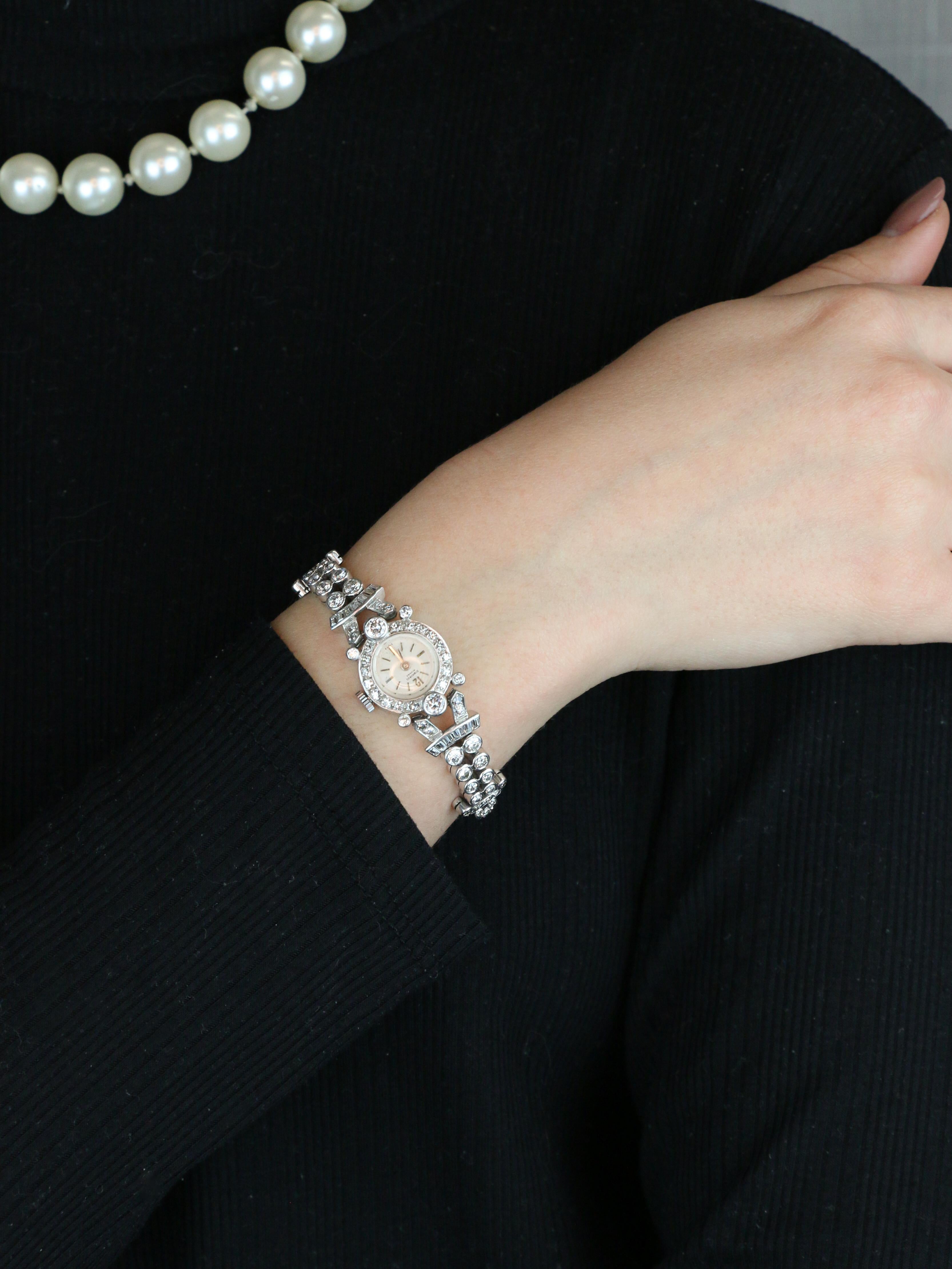 Montre Art Deco or blanc platine diamants