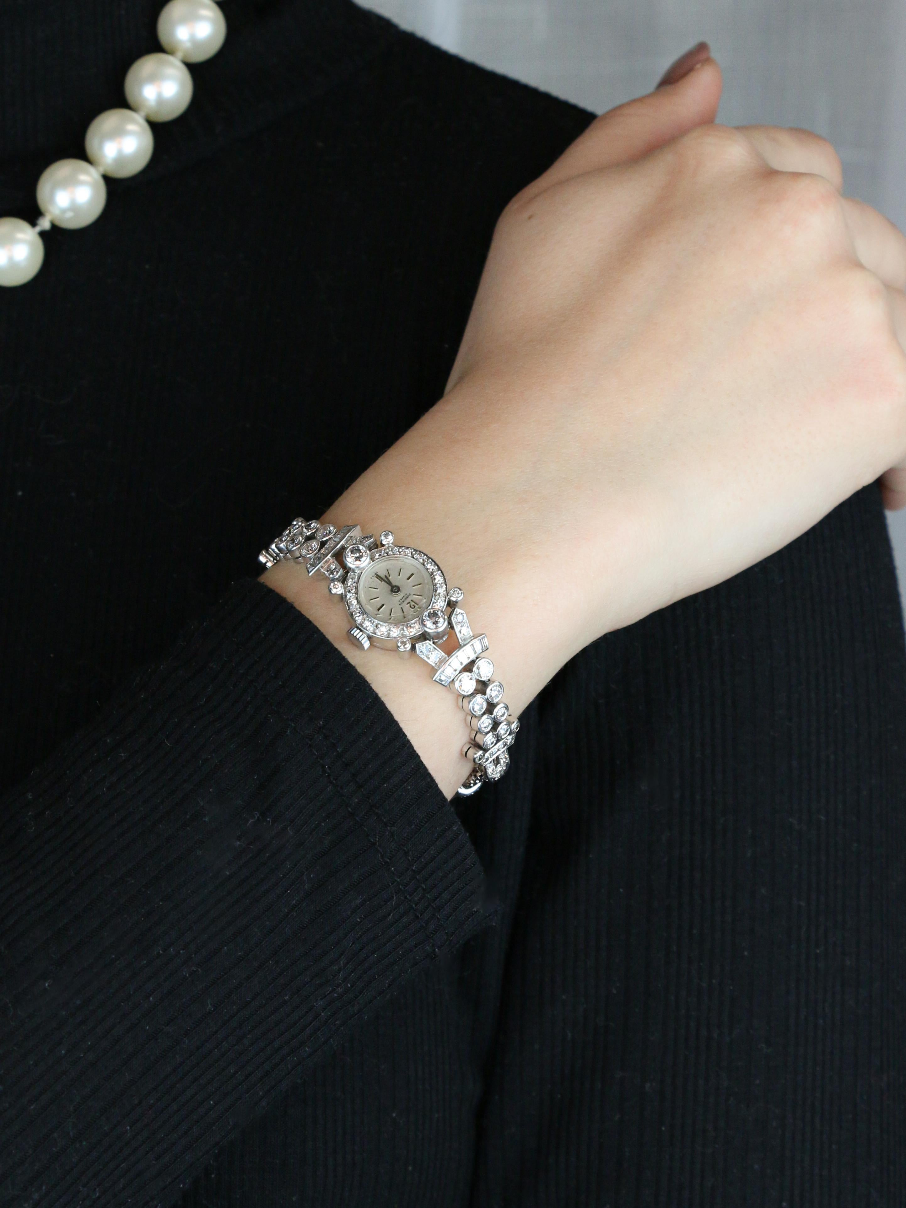 Montre Art Deco or blanc platine diamants