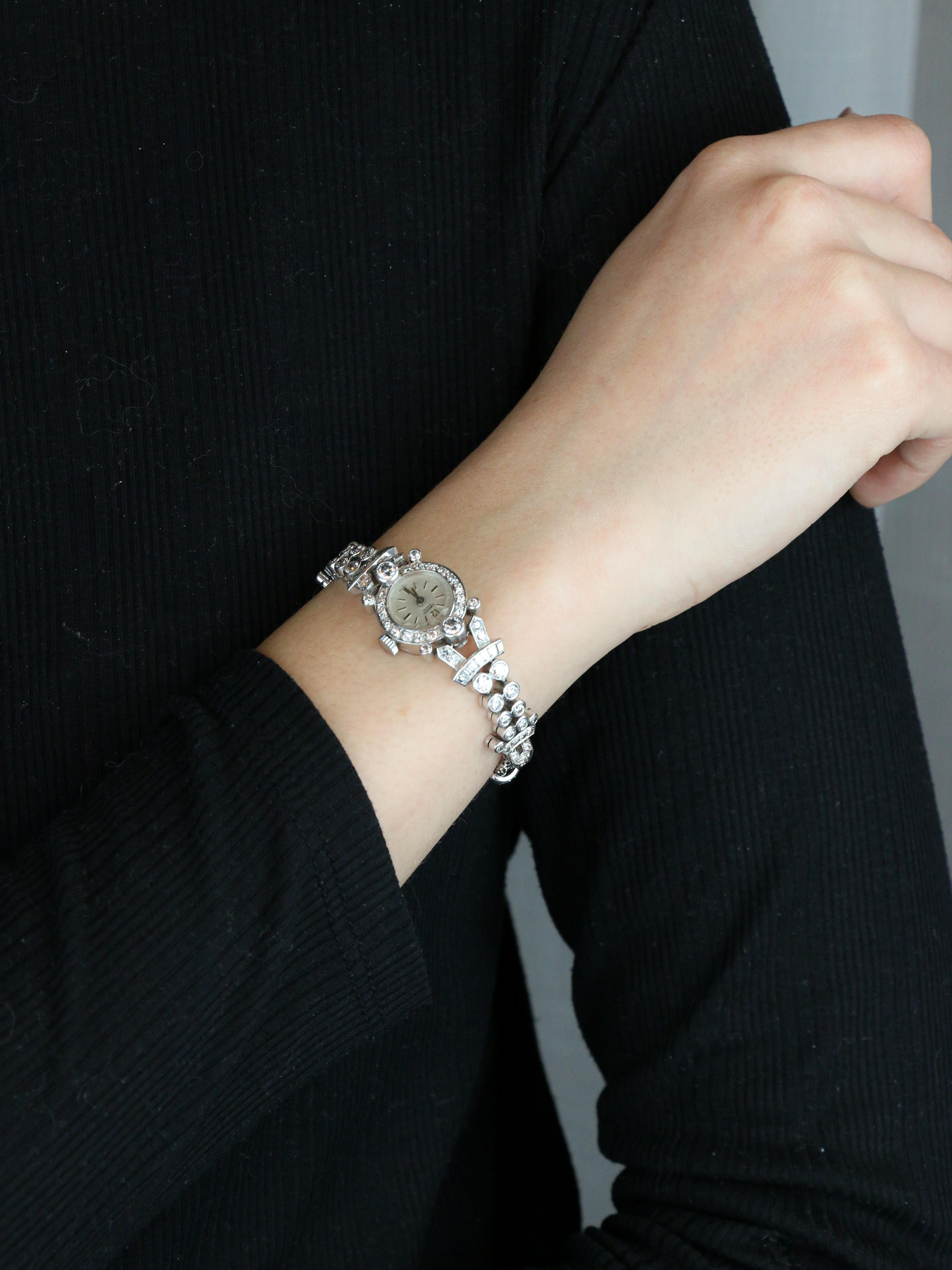 Montre Art Deco or blanc platine diamants