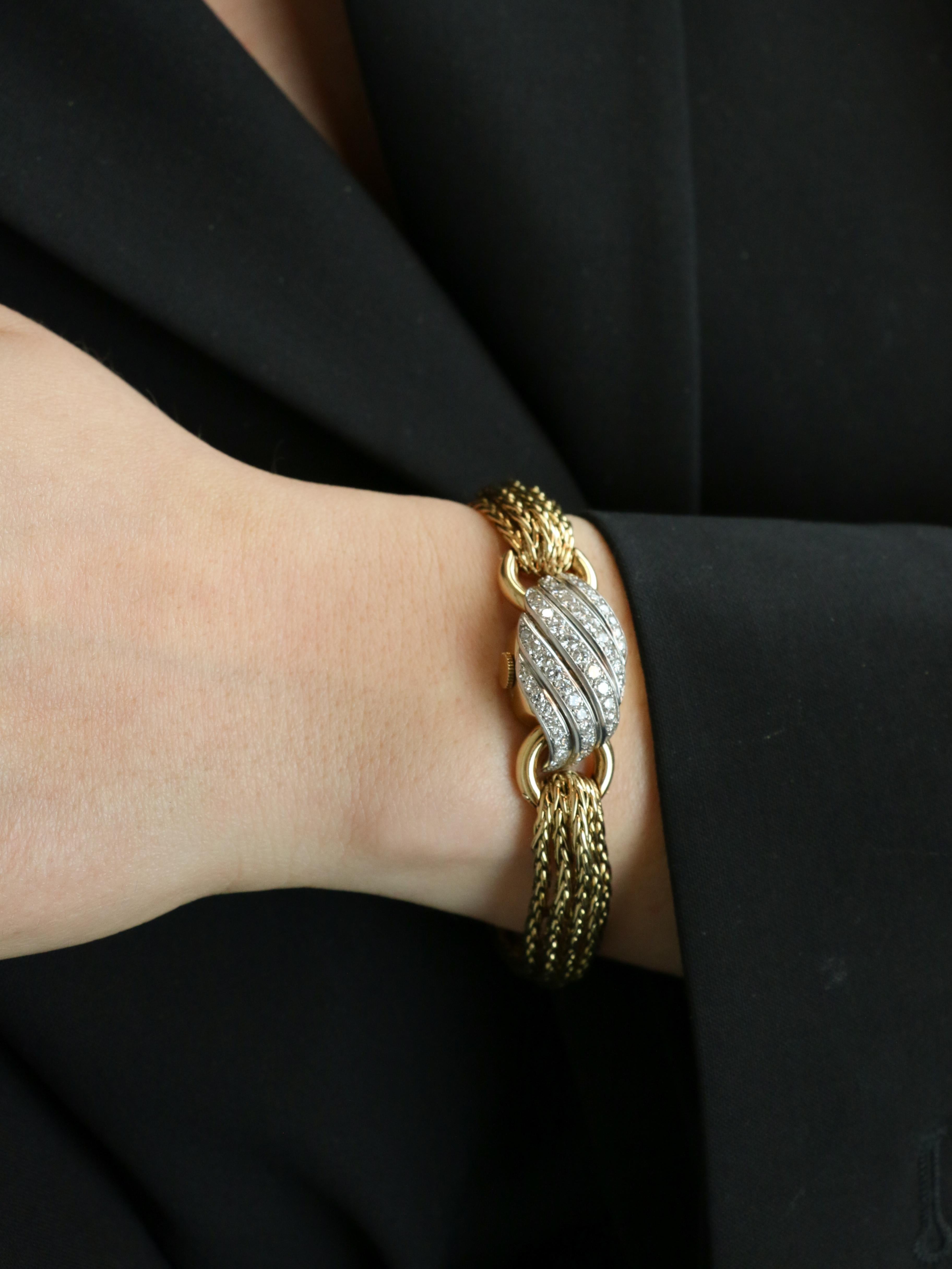 BOUCHERON Montre à secrets or jaune diamants