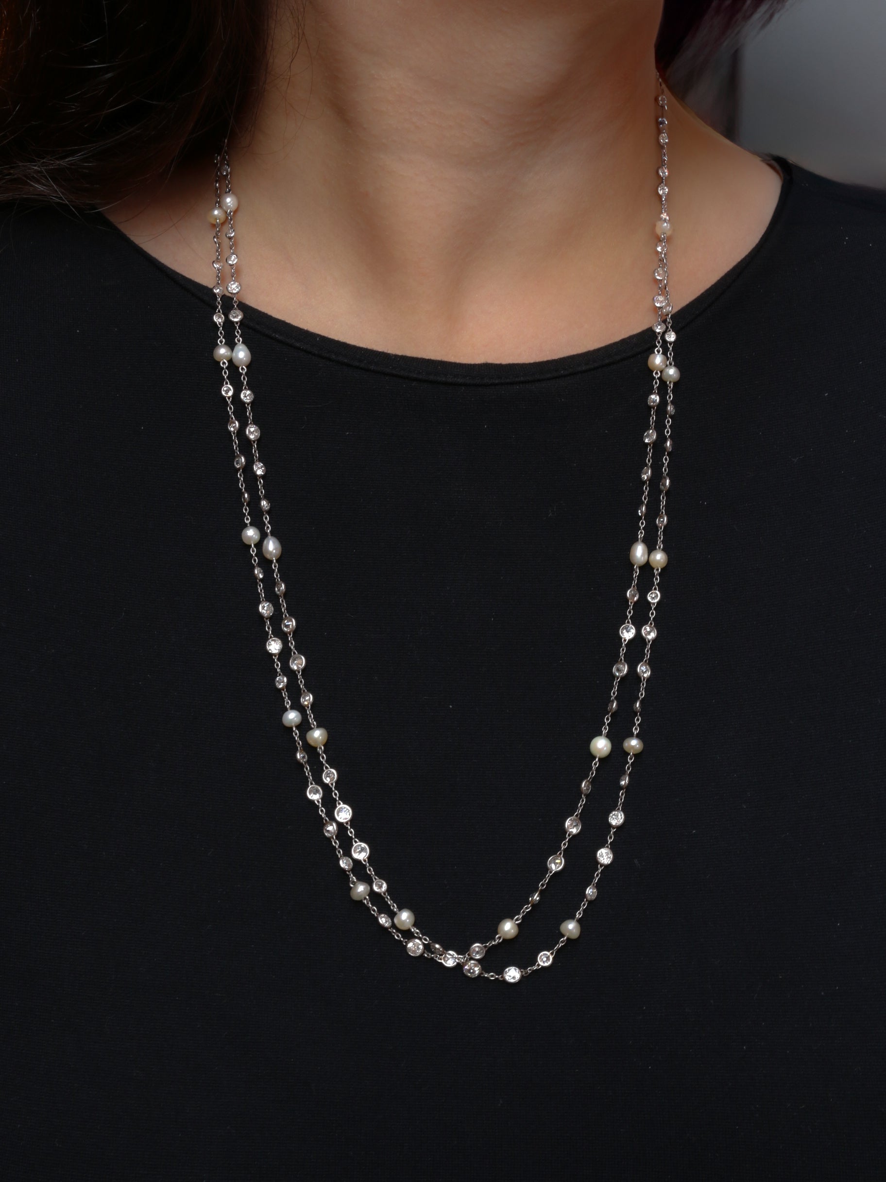 Sautoir Belle-Epoque platine or diamants perles fines