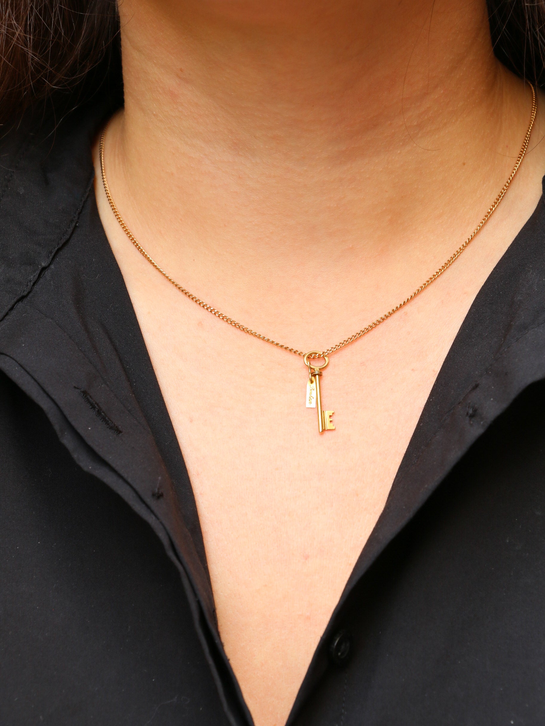 Pendentif porte-bonheur vintage Clé en or