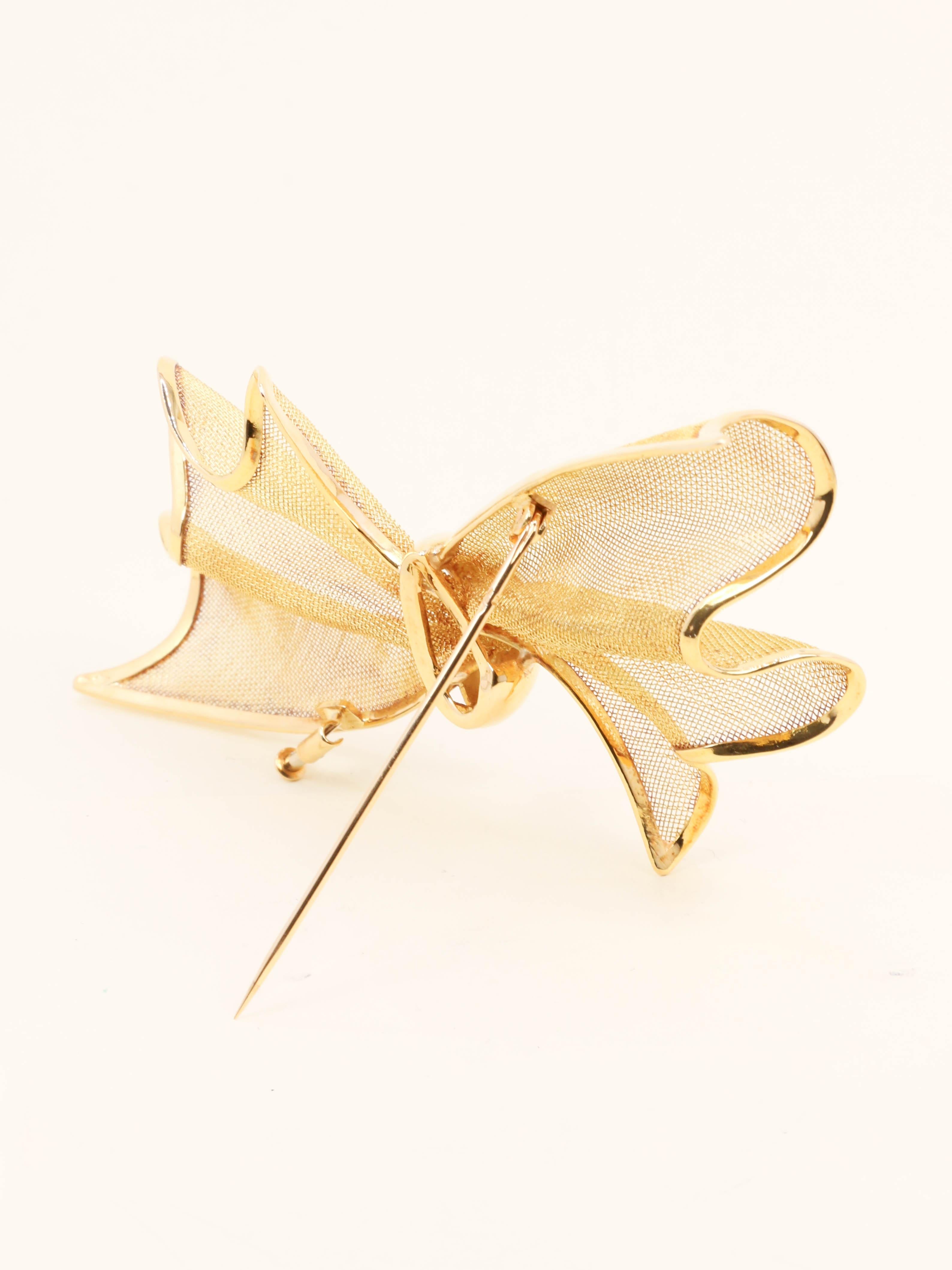 Broche nœud papillon or jaune