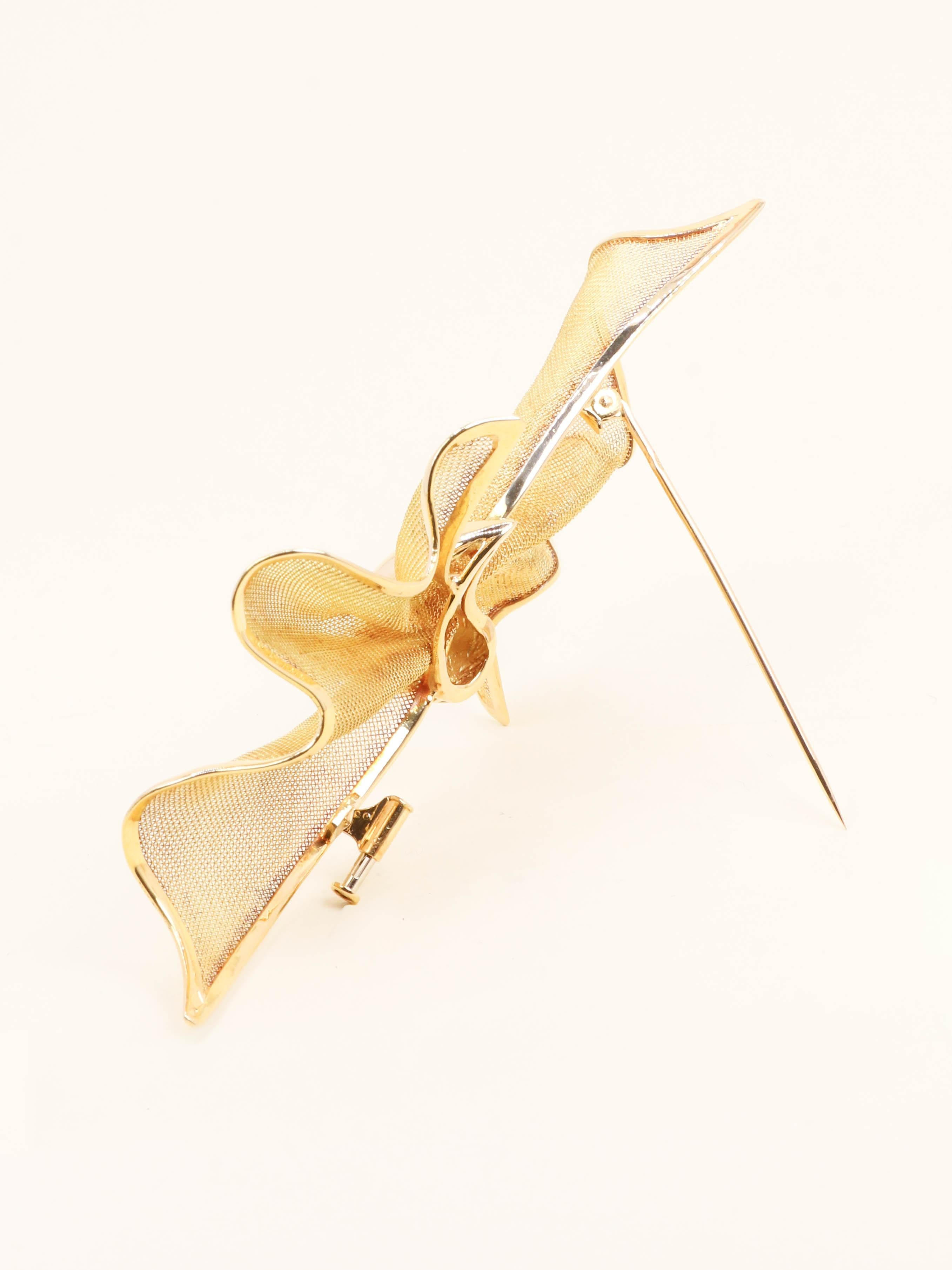 Broche nœud papillon or jaune