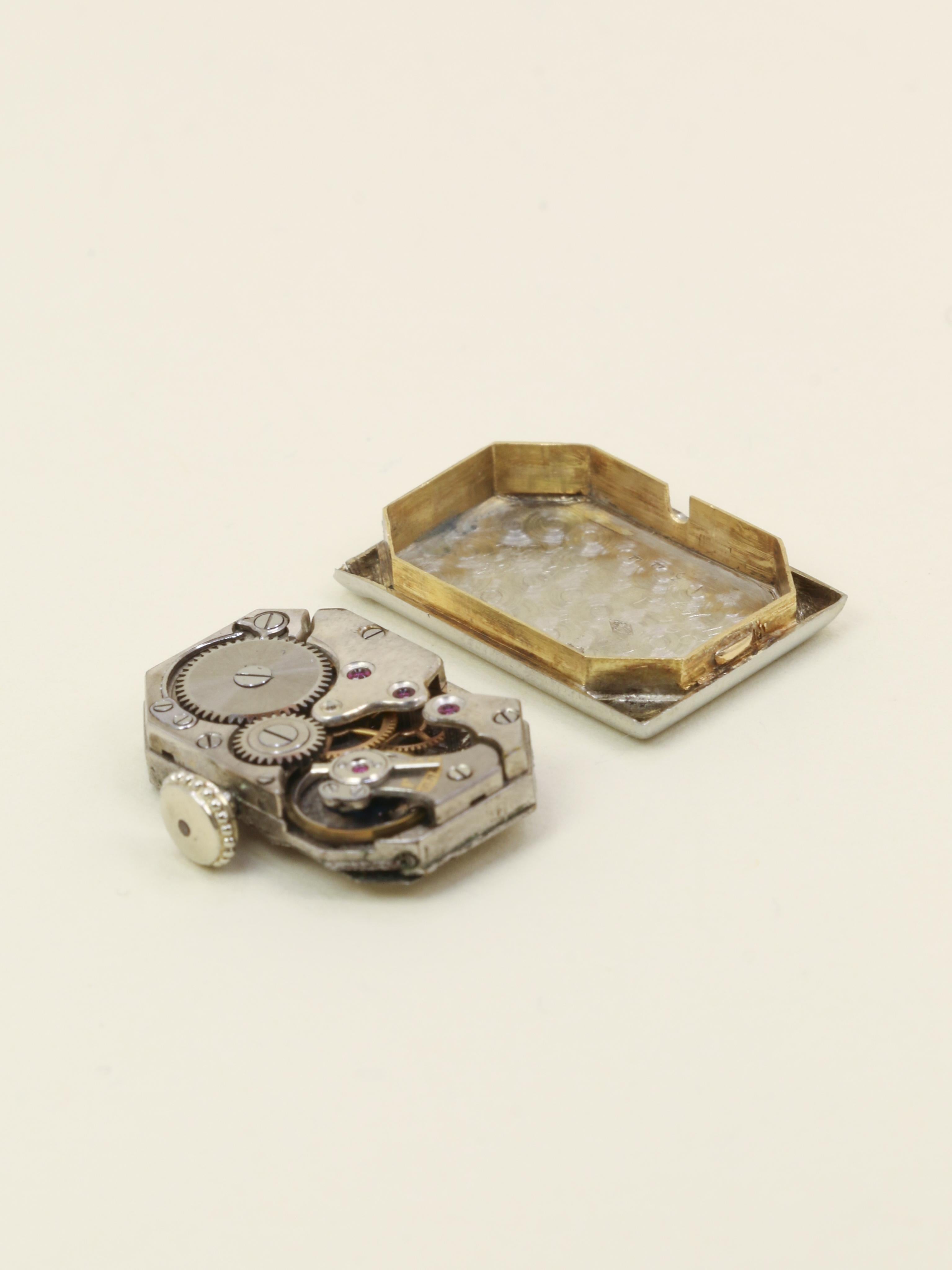 Montre Art Déco or blanc diamants