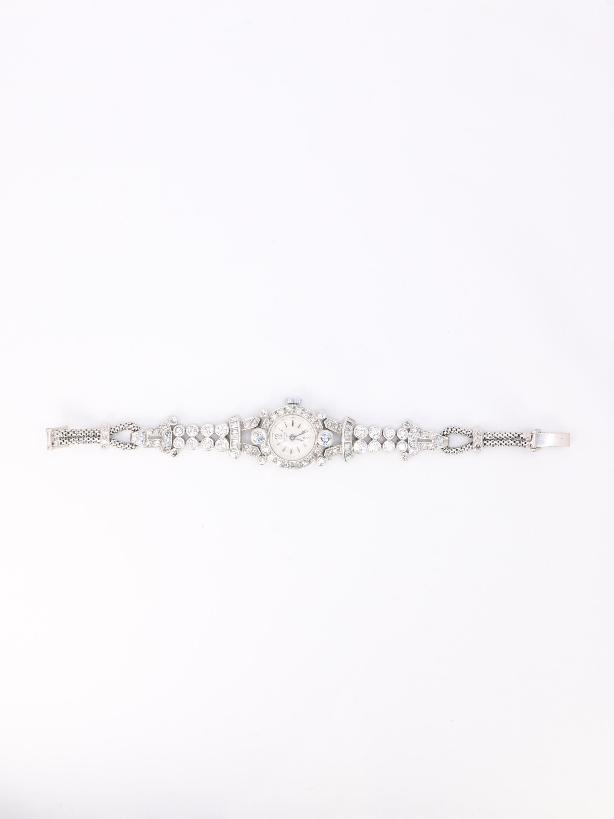 Montre Art Deco or blanc platine diamants