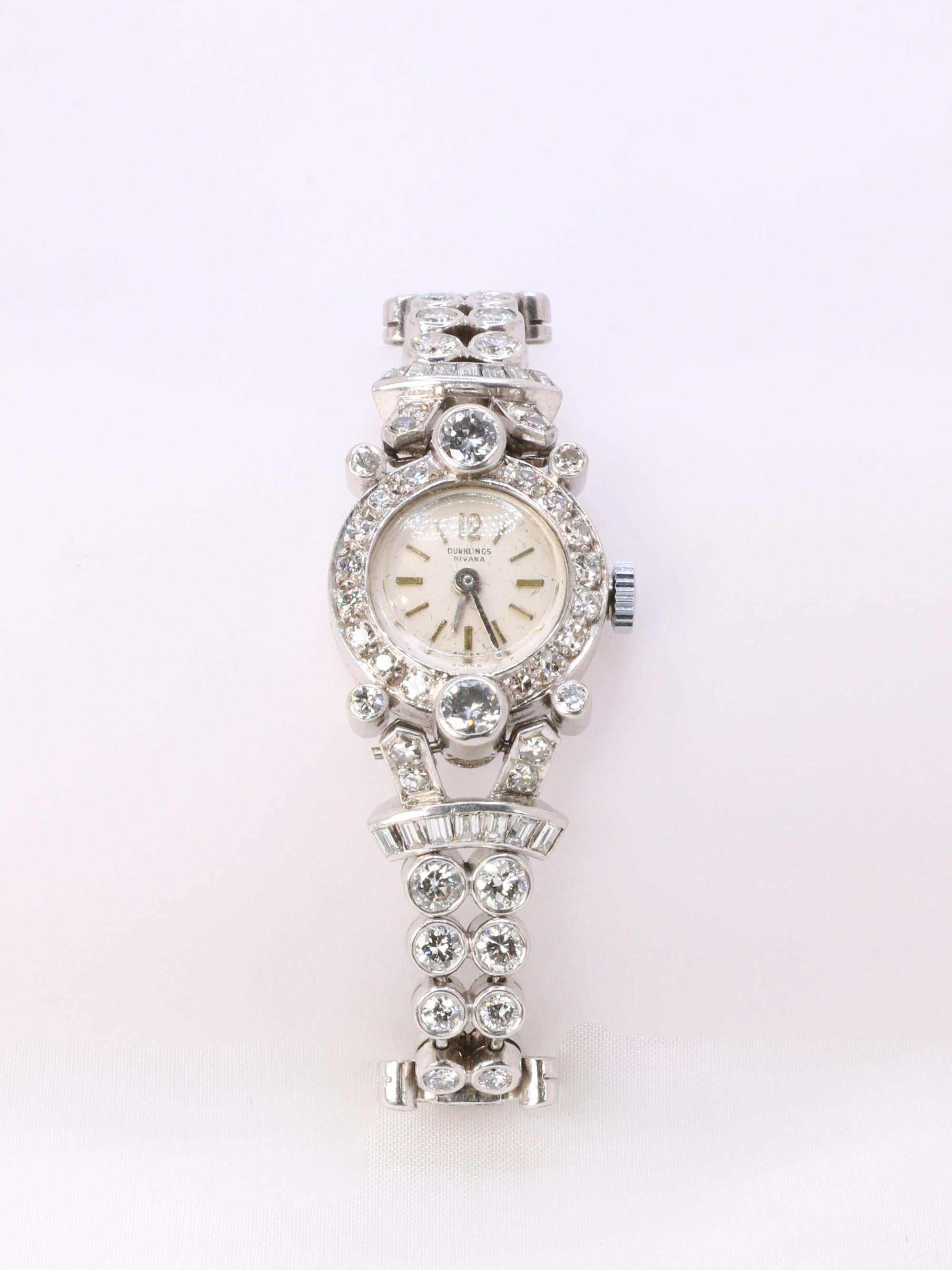 Montre Art Deco or blanc platine diamants