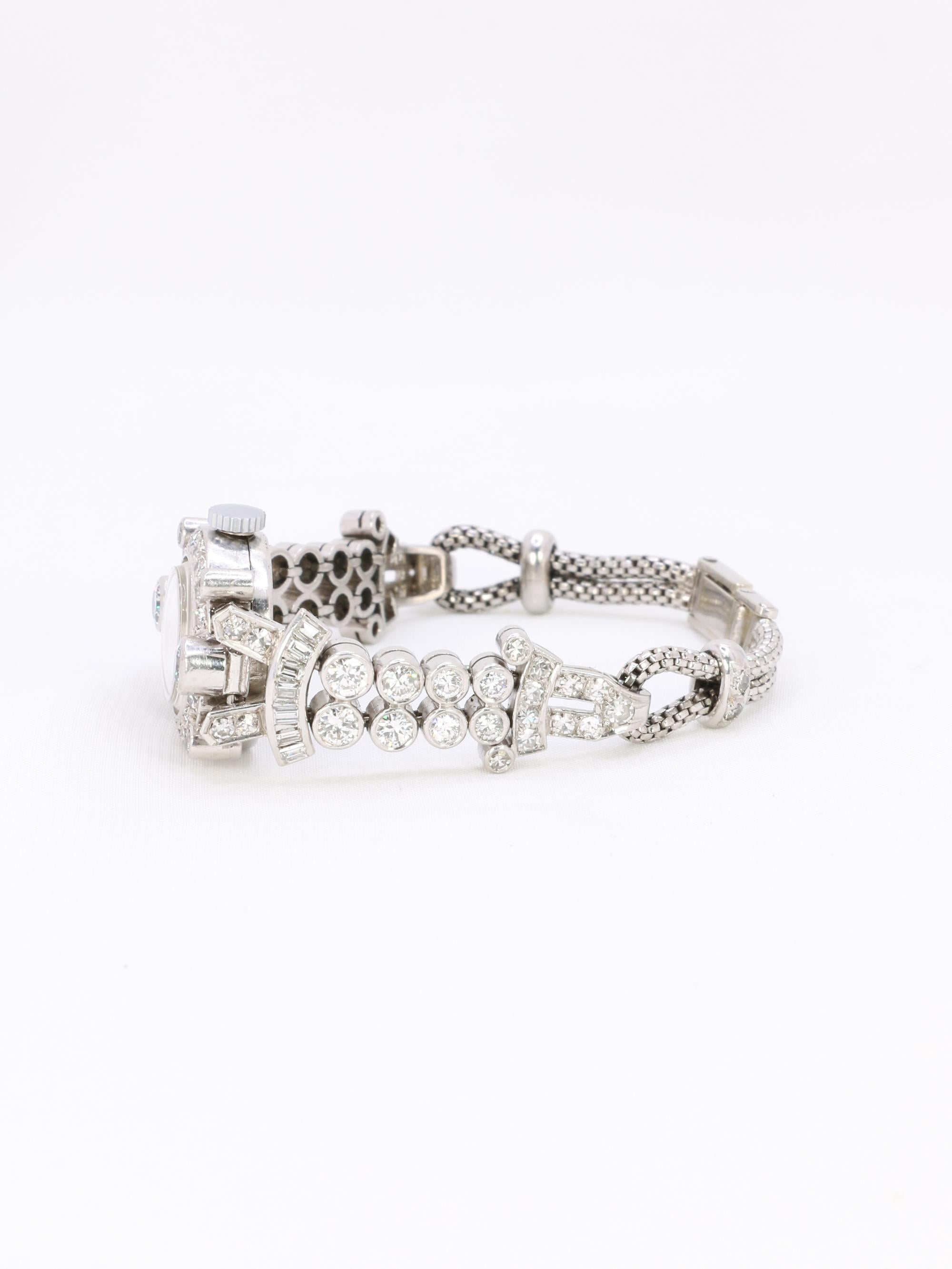 Montre Art Deco or blanc platine diamants