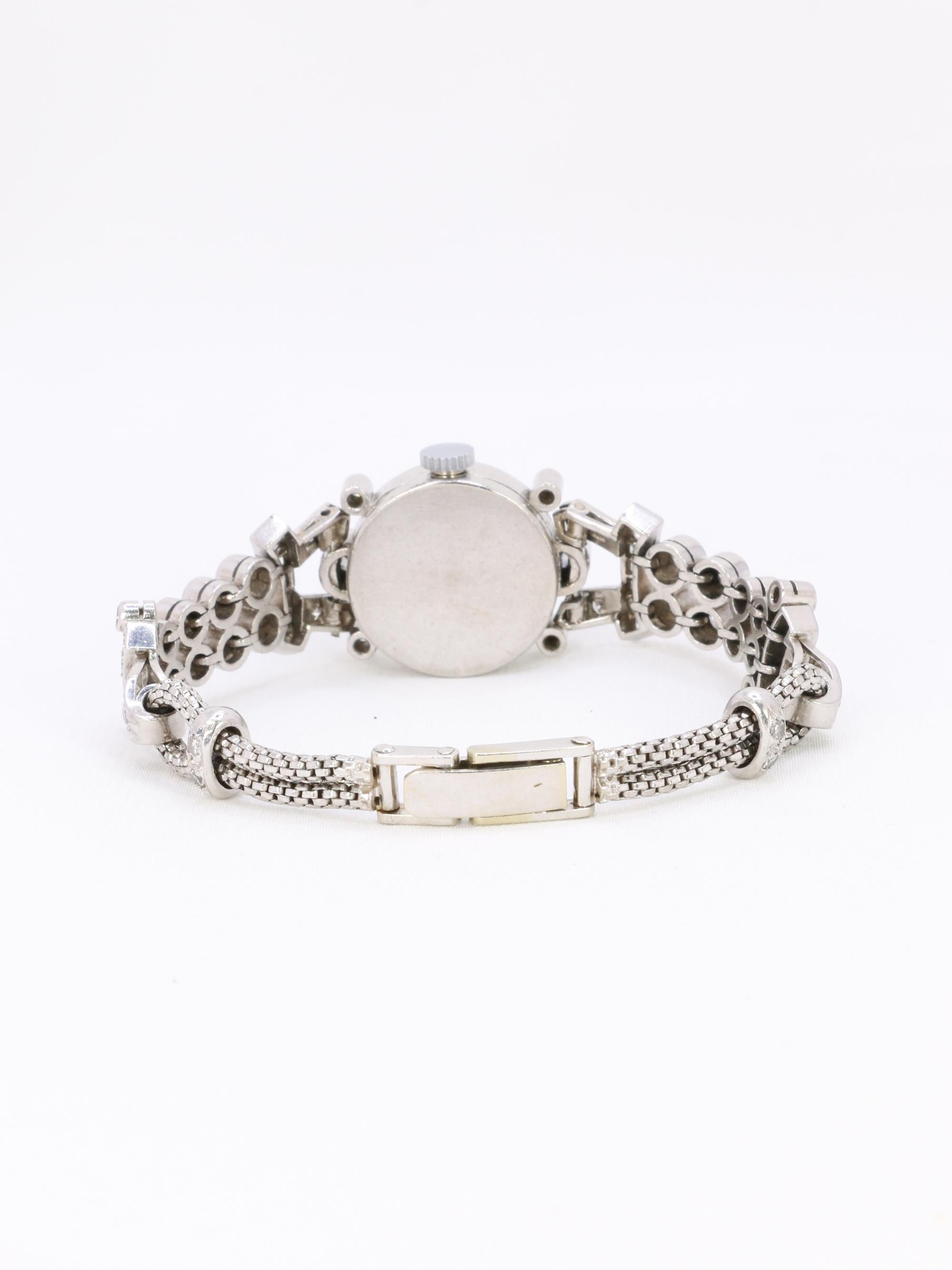 Montre Art Deco or blanc platine diamants