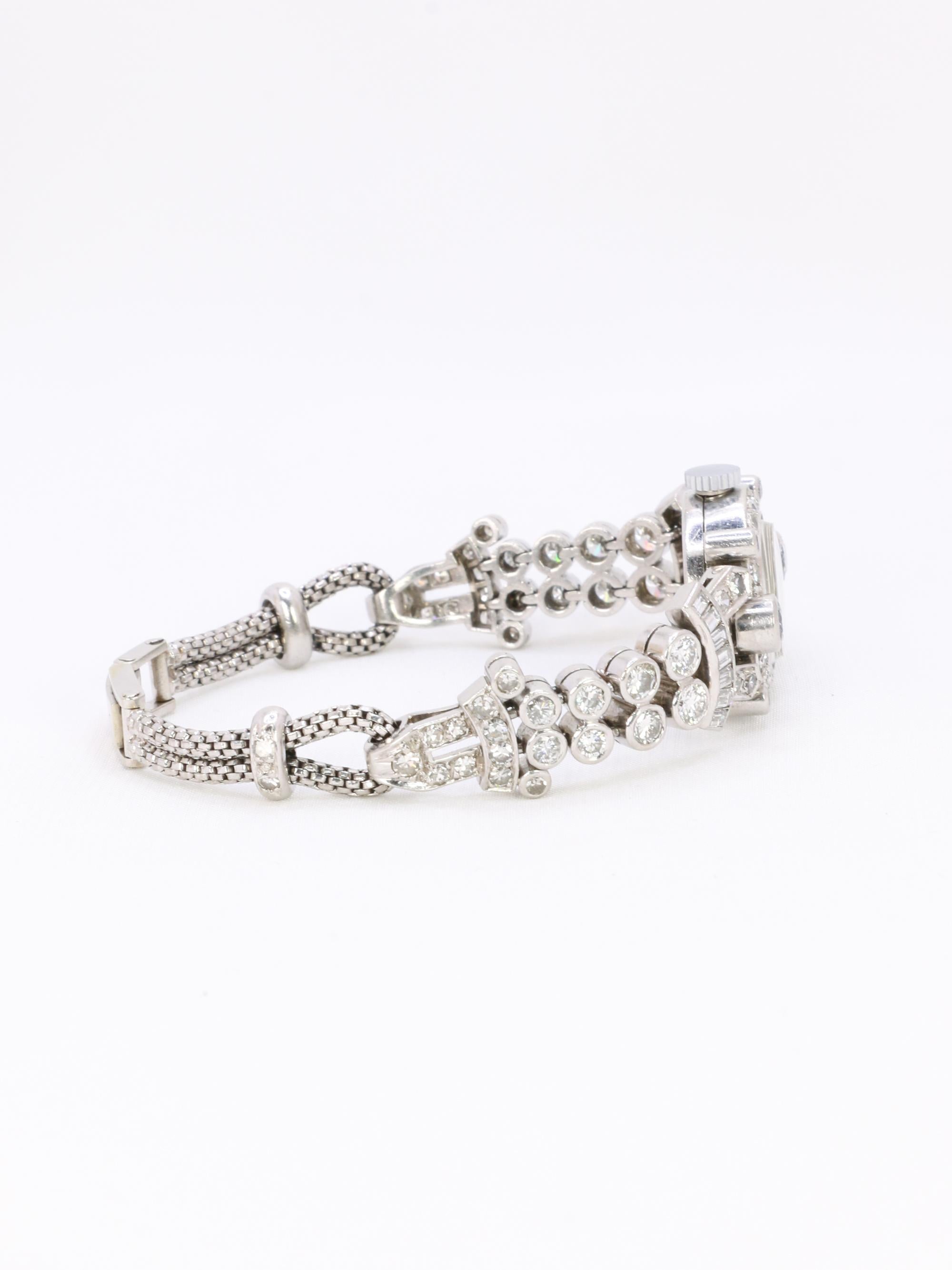 Montre Art Deco or blanc platine diamants
