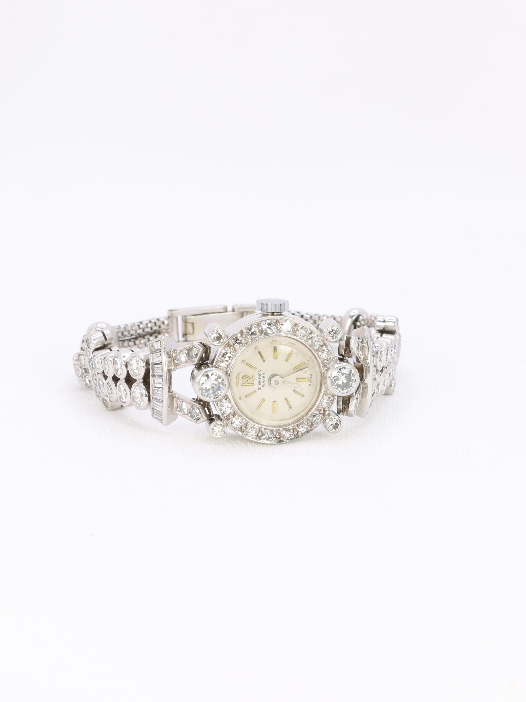 Montre Art Deco or blanc platine diamants
