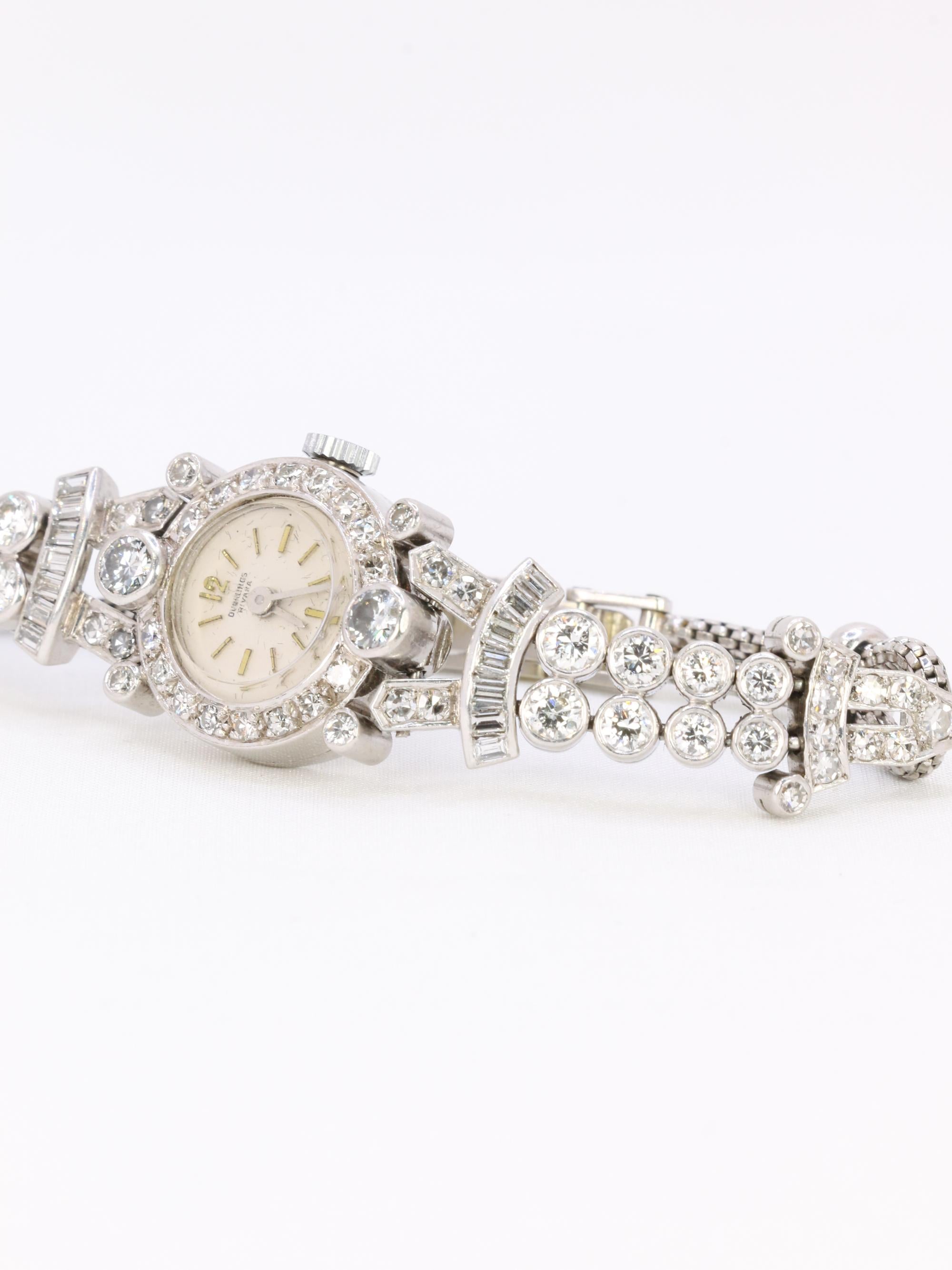 Montre Art Deco or blanc platine diamants