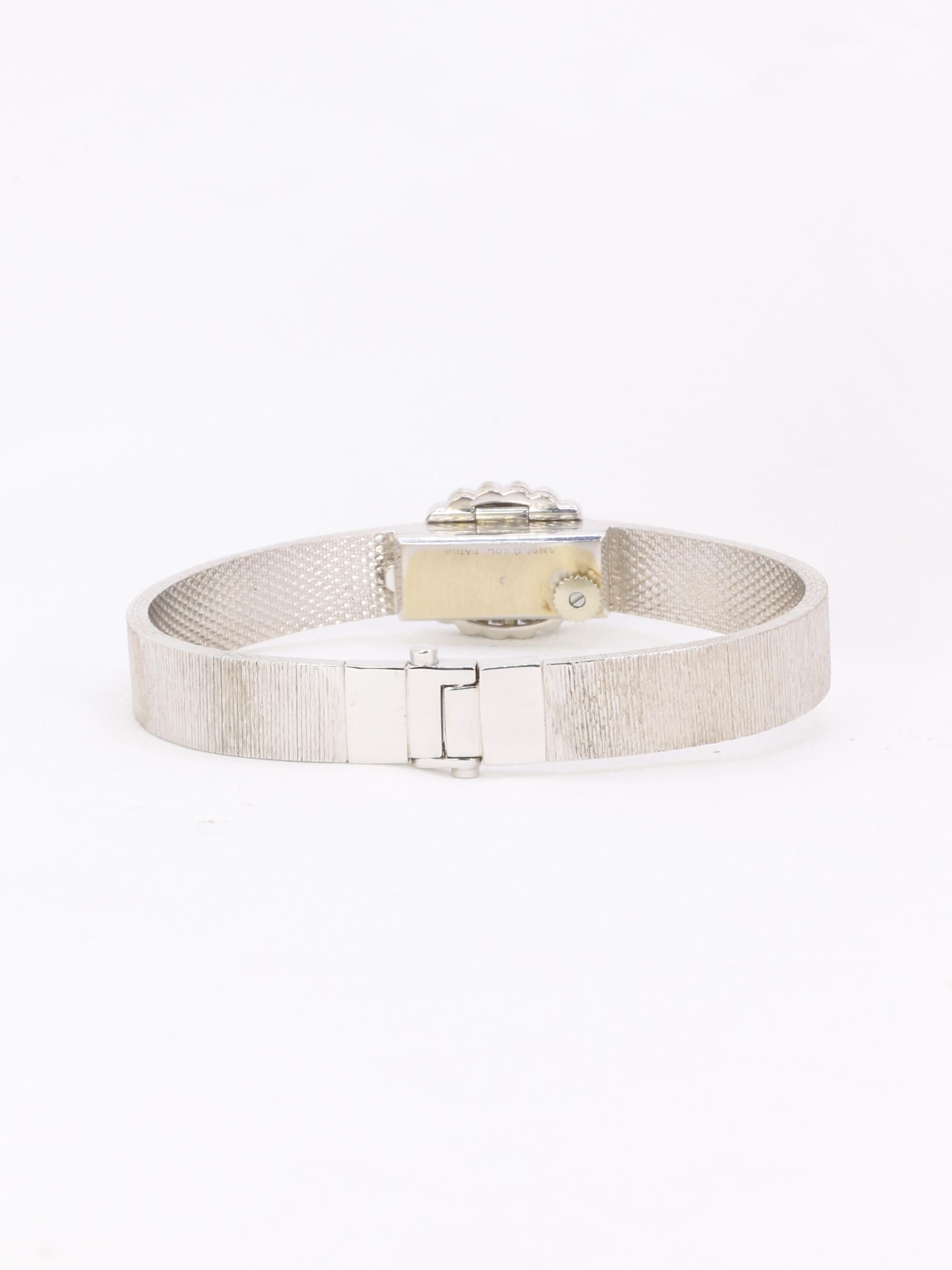 ANDRE COL Montre à secret or blanc diamants