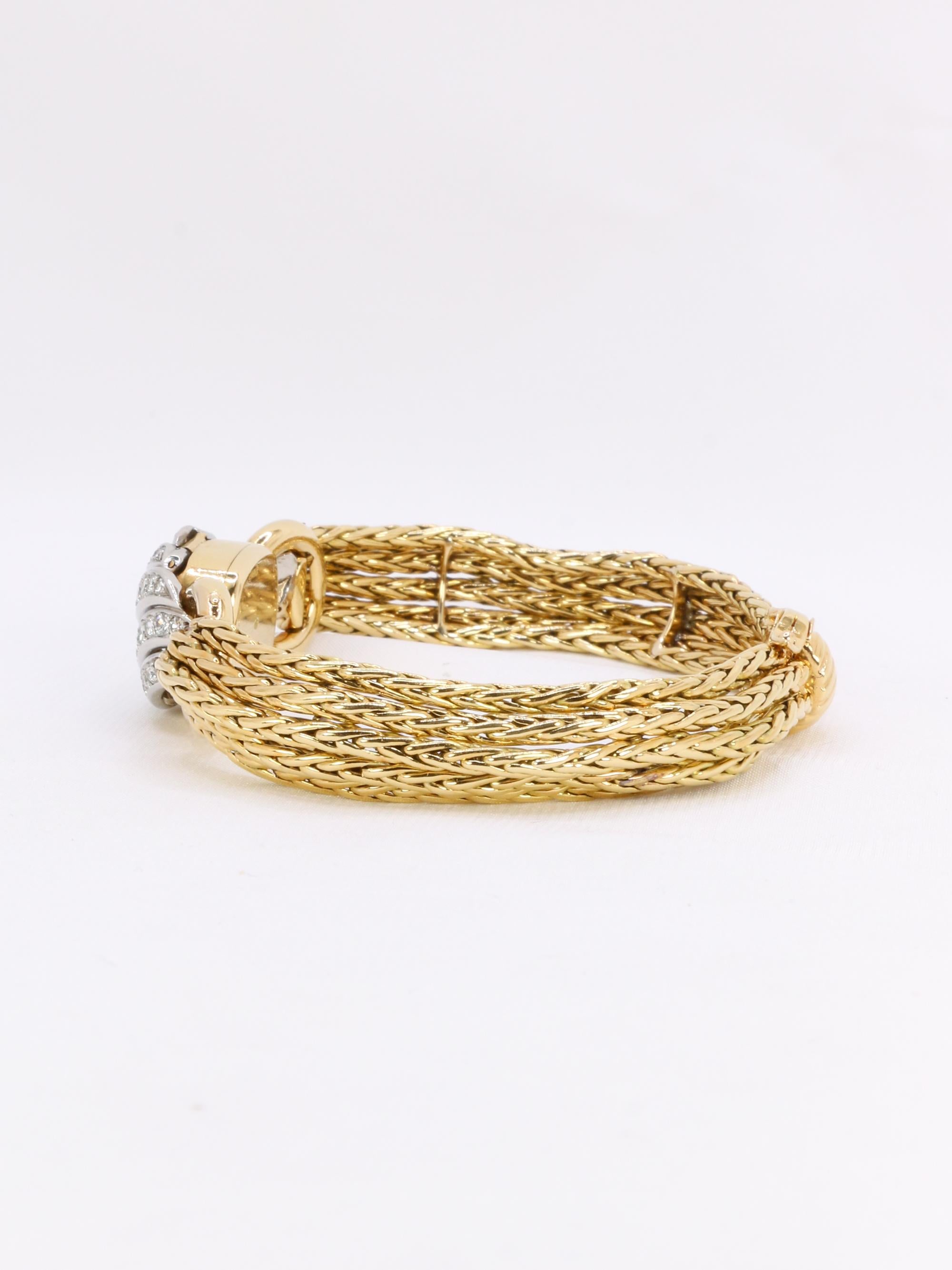 BOUCHERON Montre à secrets or jaune diamants