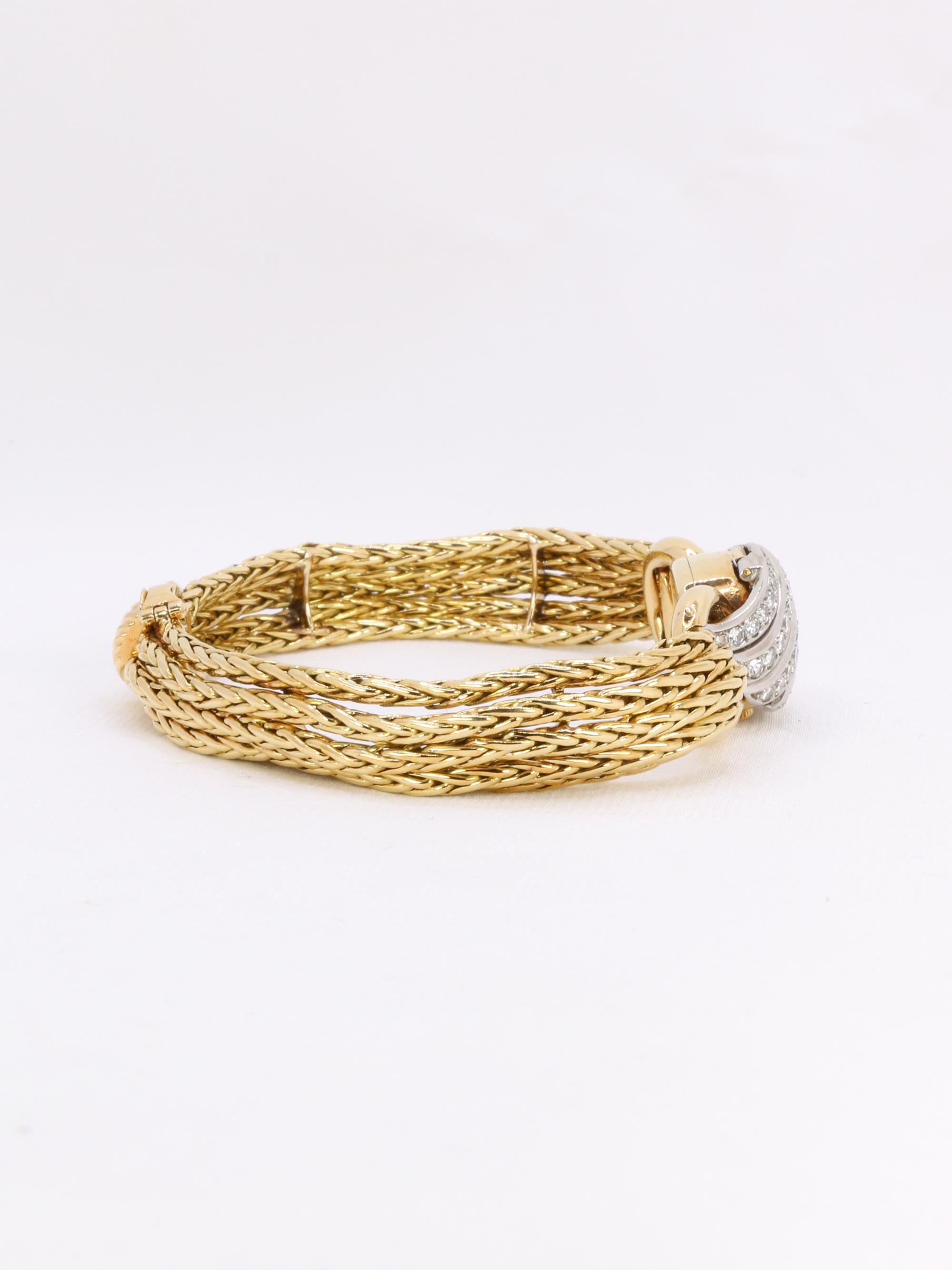 BOUCHERON Montre à secrets or jaune diamants