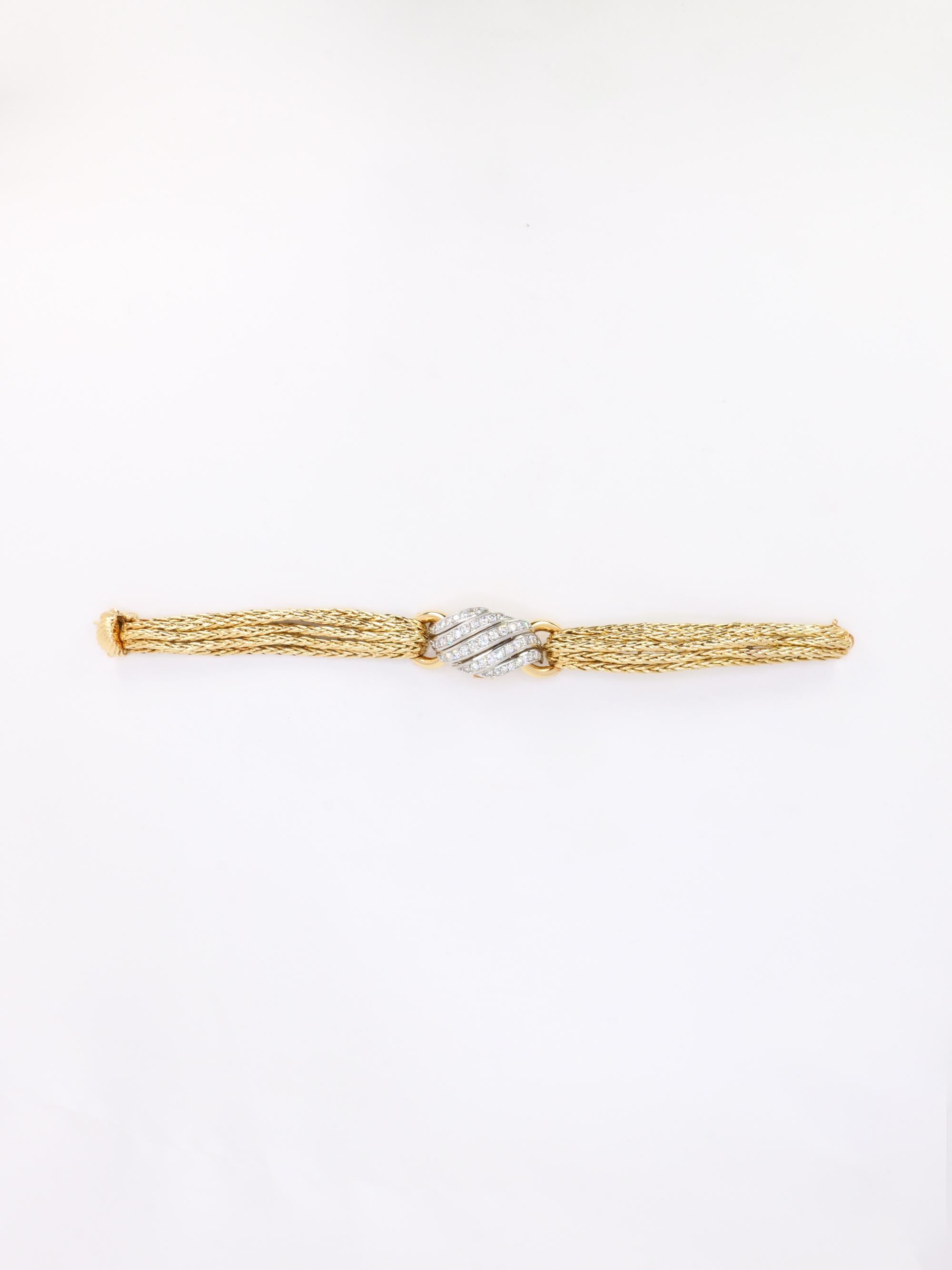 BOUCHERON Montre à secrets or jaune diamants