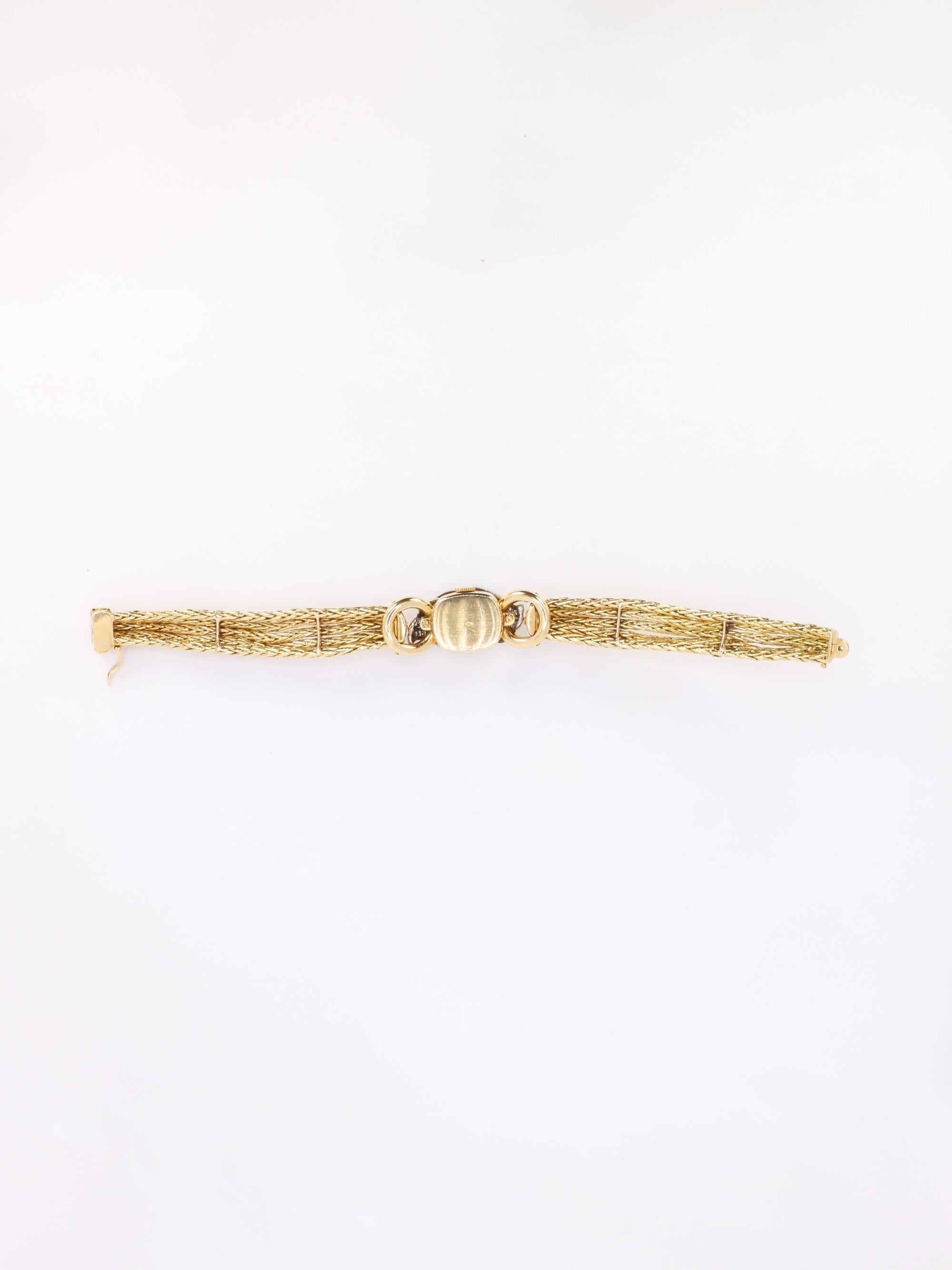 BOUCHERON Montre à secrets or jaune diamants