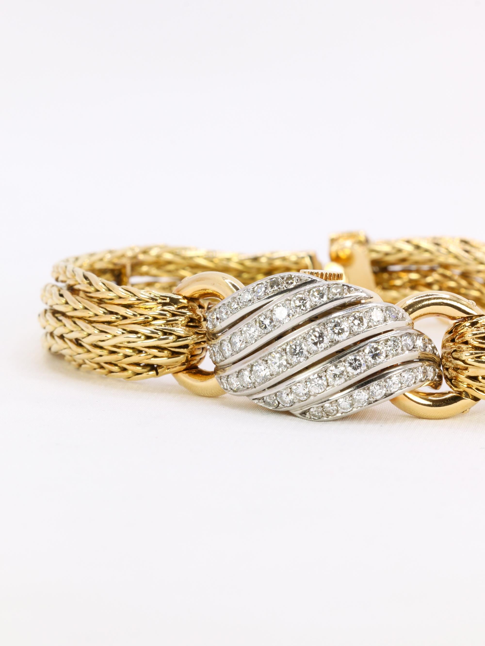 BOUCHERON Montre à secrets or jaune diamants