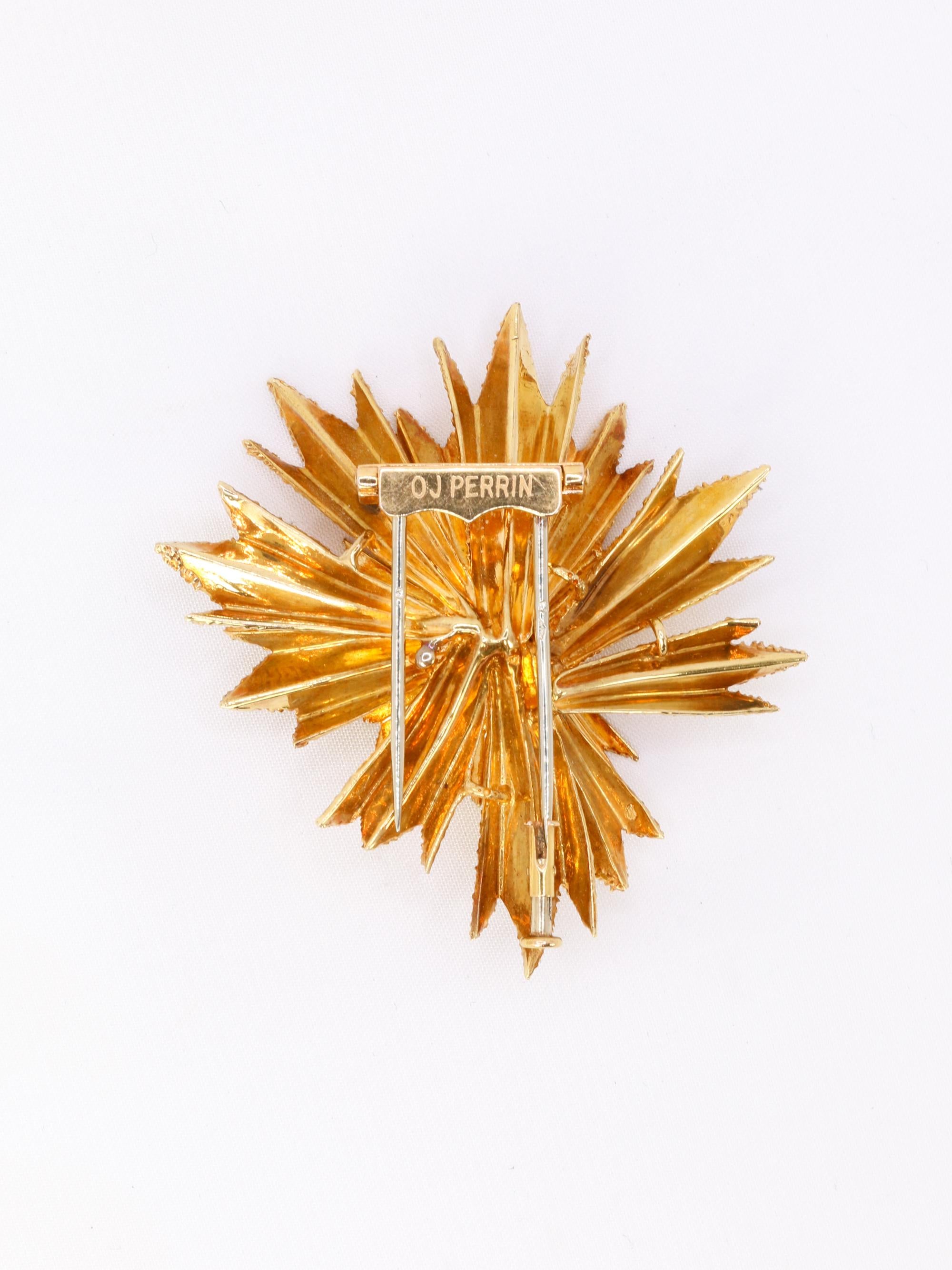 OJ PERRIN Broche étoile or jaune