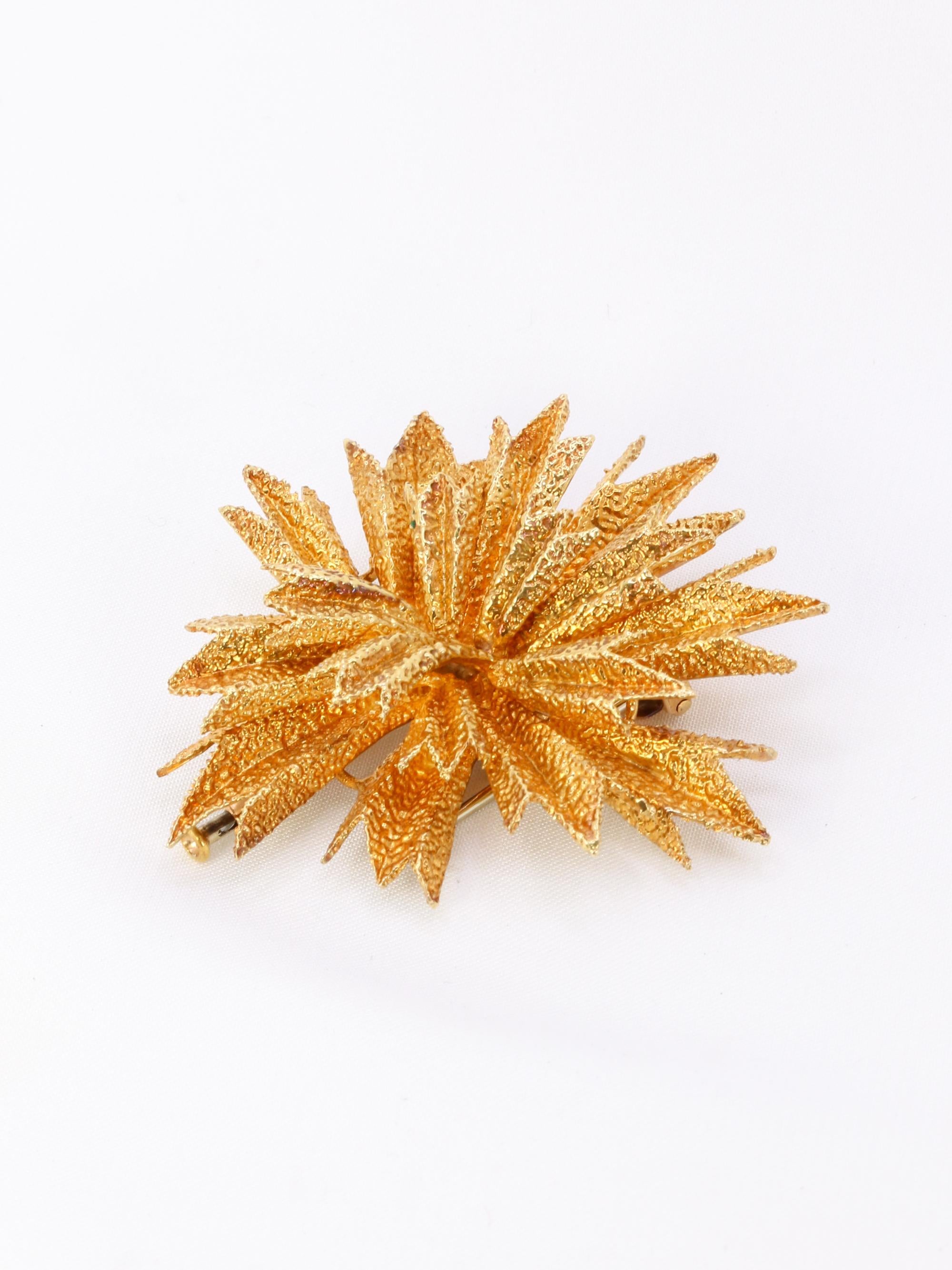 OJ PERRIN Broche étoile or jaune
