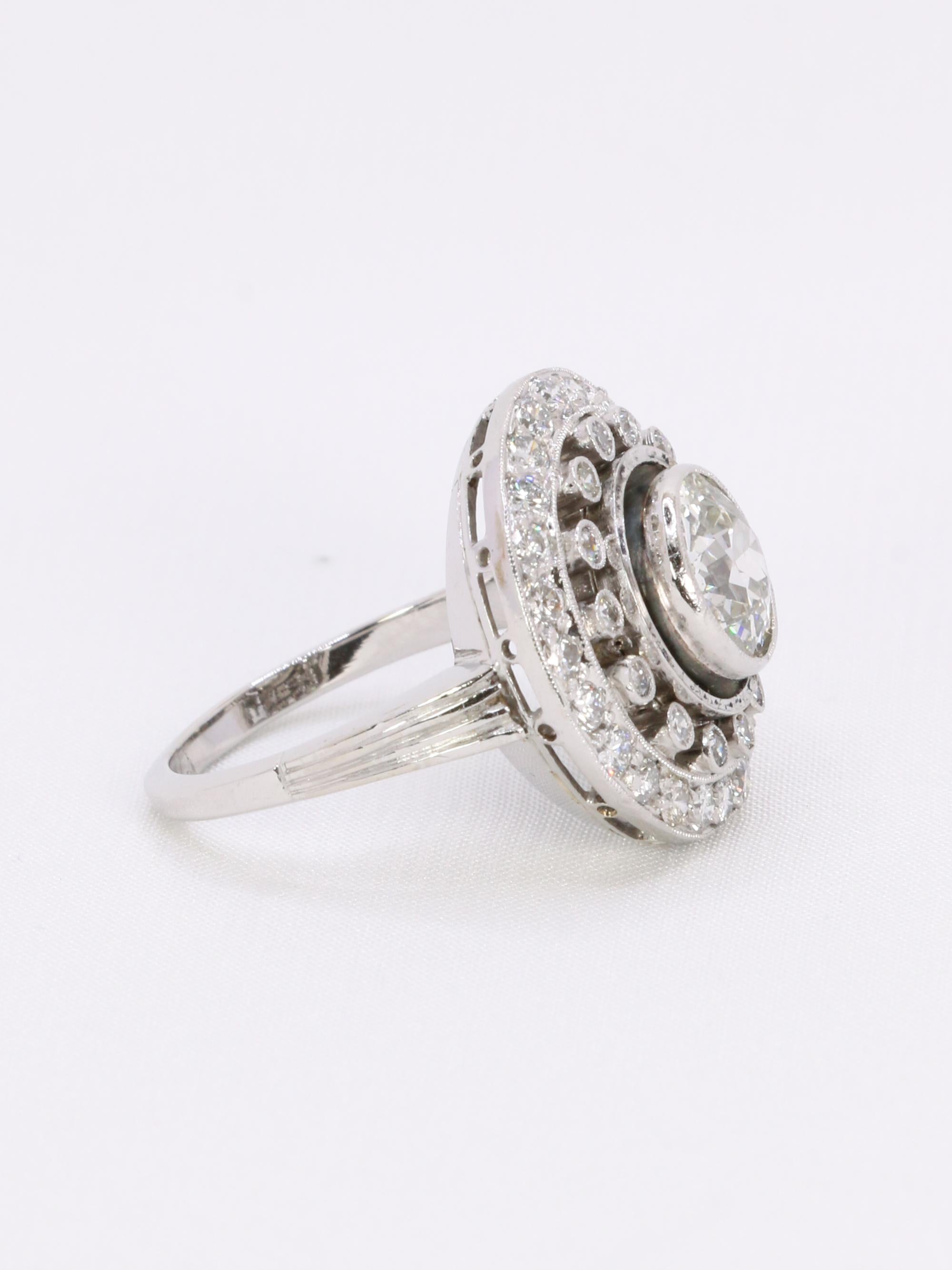 Bague cible double entourage diamants taille ancienne 2 carats
