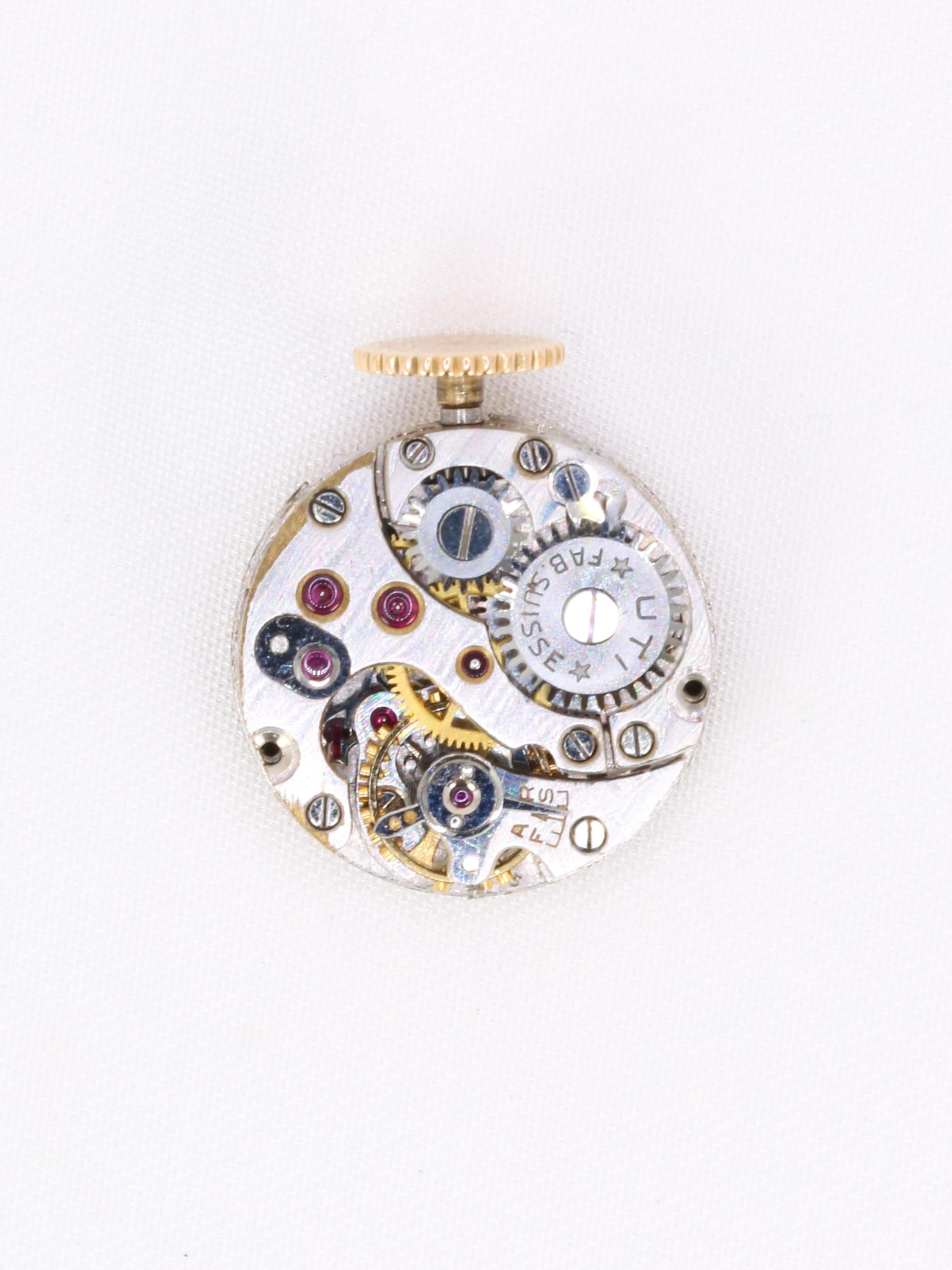 UTI Montre à secret tubogas or jaune diamants rubis calibrés