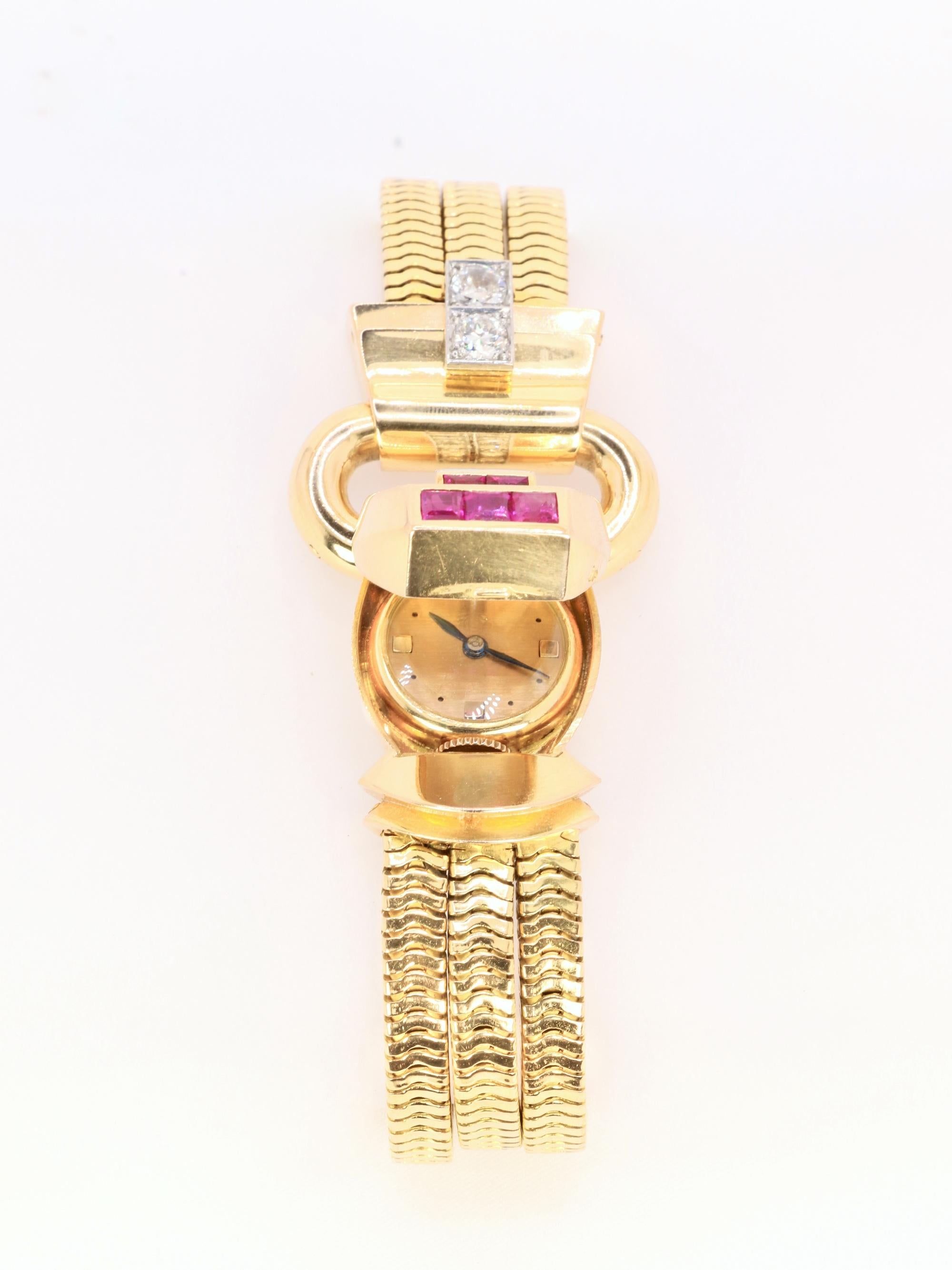 UTI Montre à secret tubogas or jaune diamants rubis calibrés