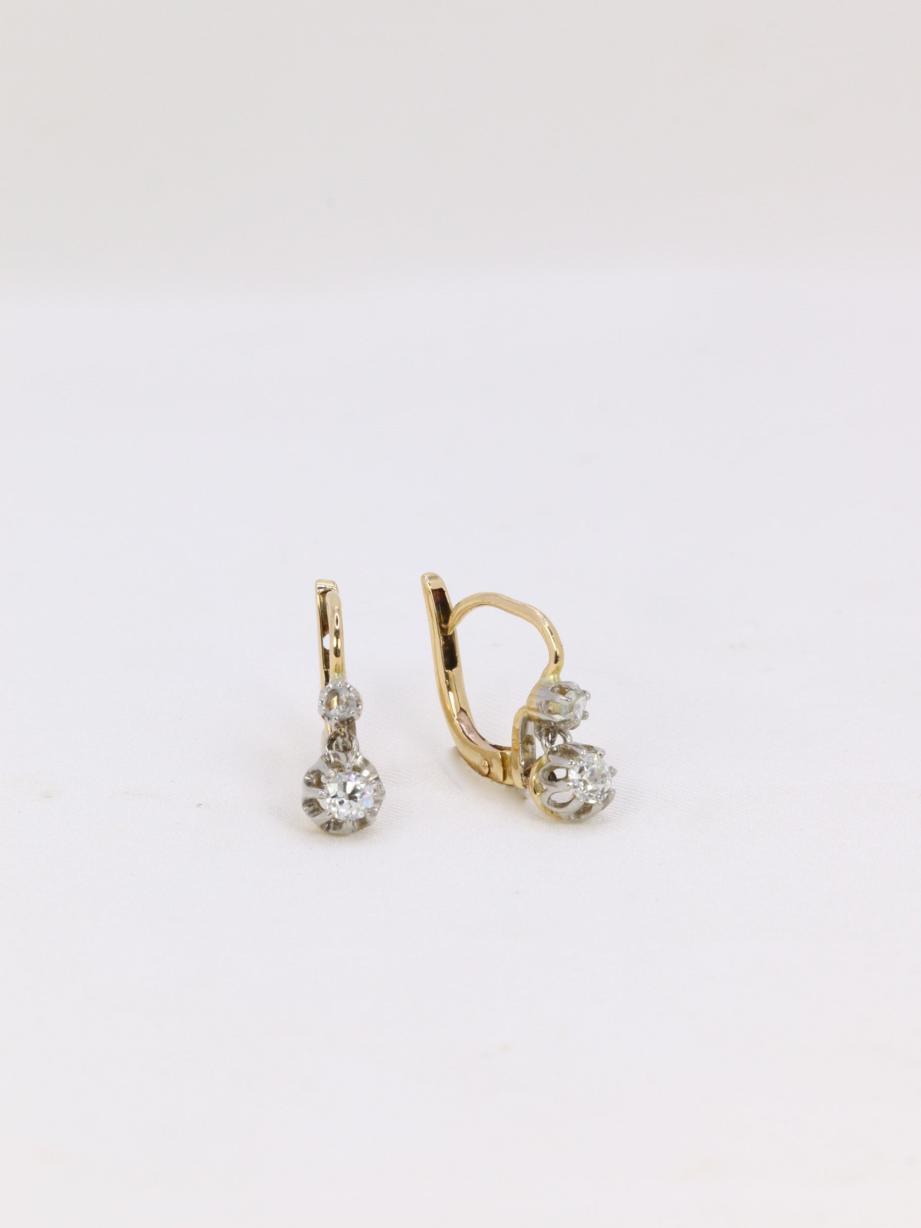 Antique sleeper earrings in gold, silver and old cut diamonds