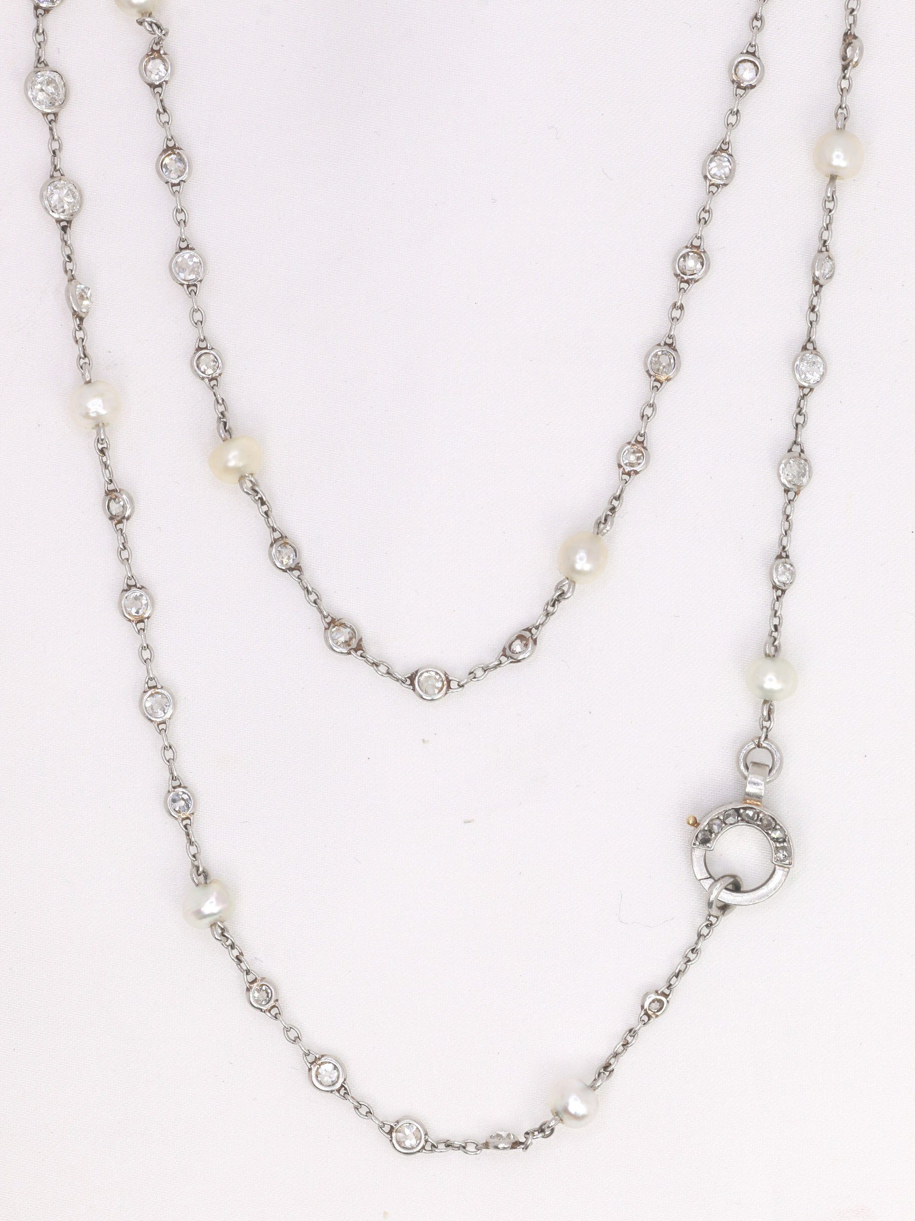 Sautoir Belle Epoque platine or perles fines diamants 16 carats