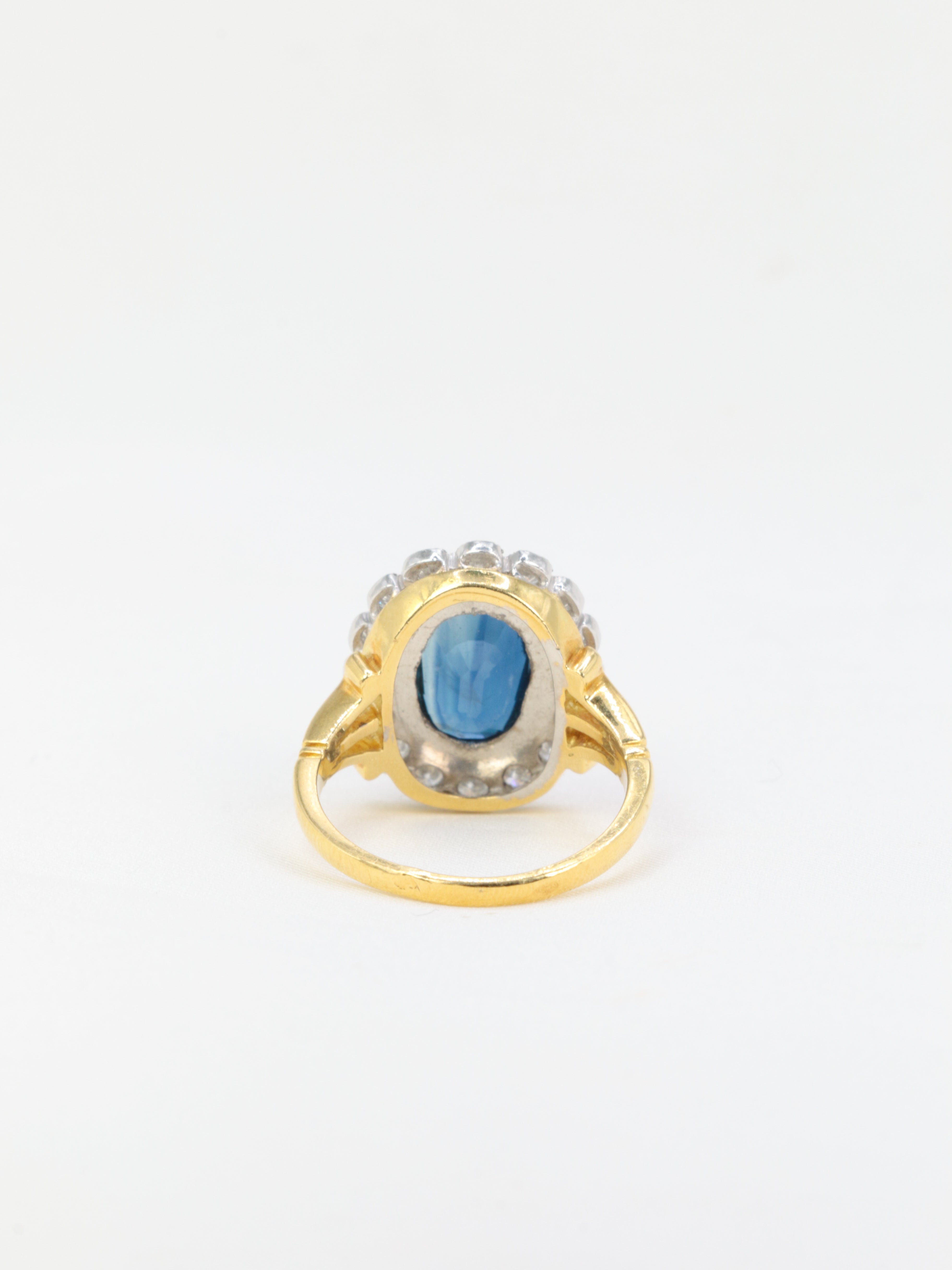 Bague vintage marguerite en or, saphir et diamants
