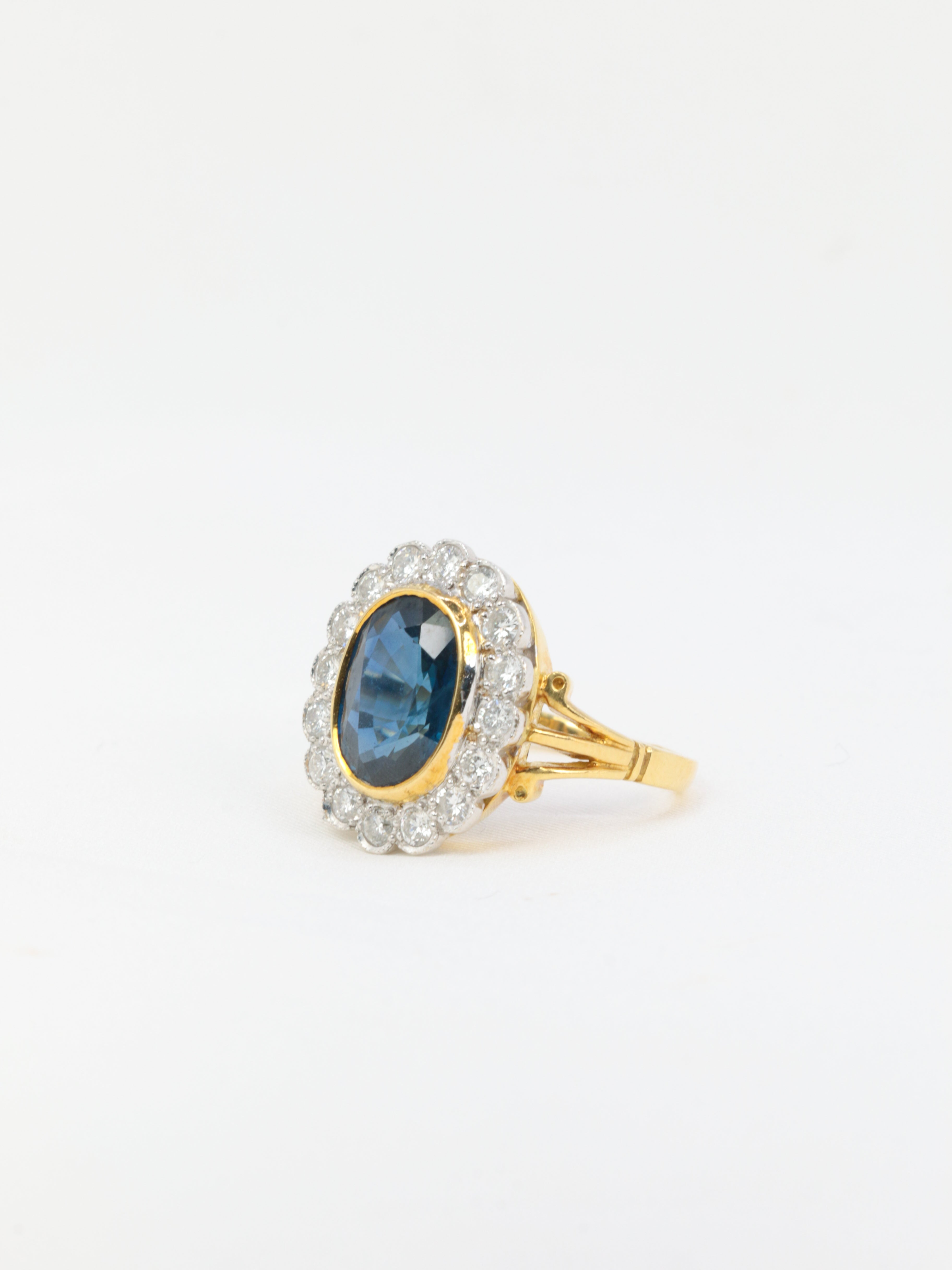 Bague vintage marguerite en or, saphir et diamants