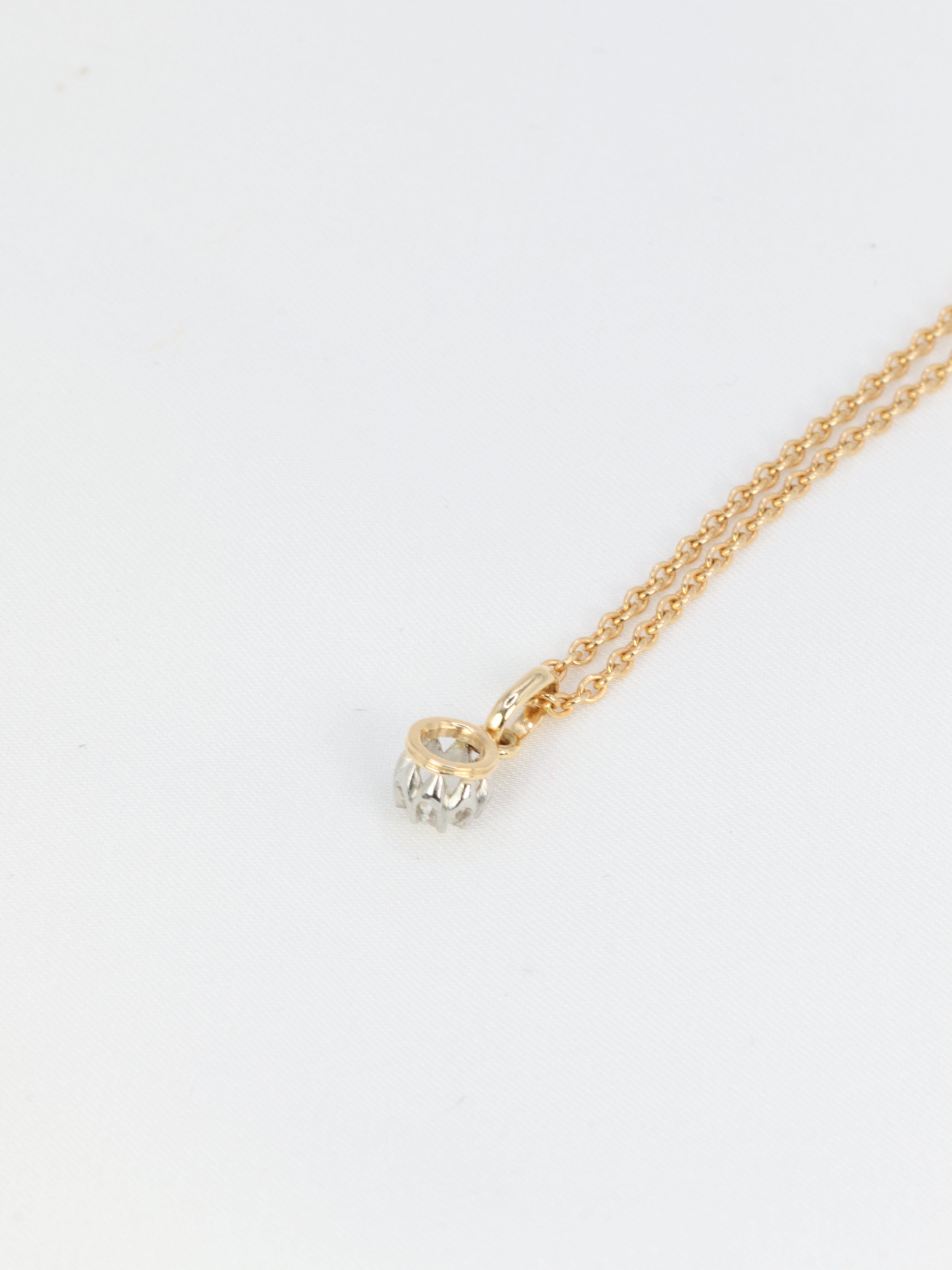 Pendentif solitaire ancien en or, argent et diamant taille ancienne 0.2 ct