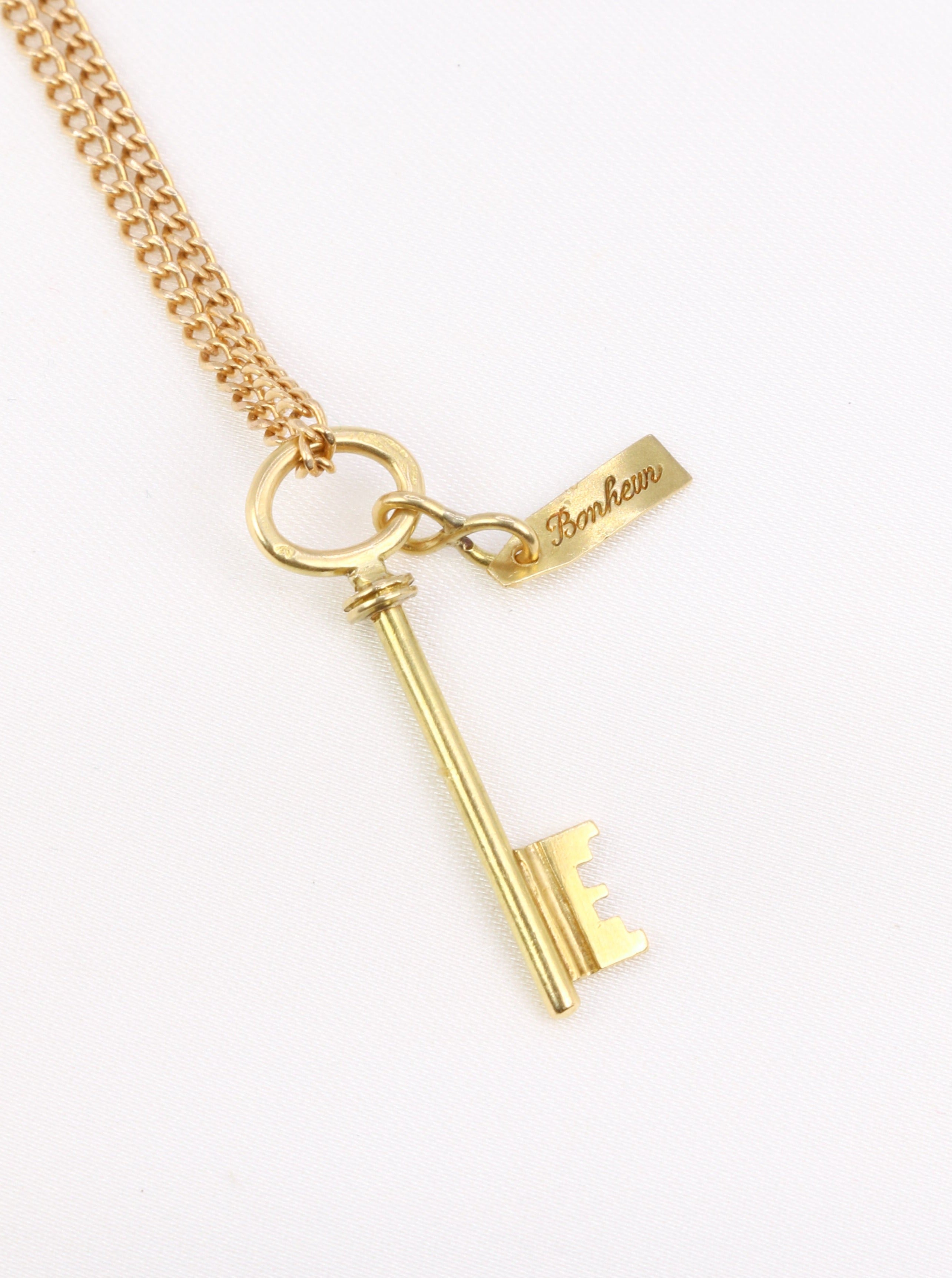 Pendentif porte-bonheur vintage Clé en or