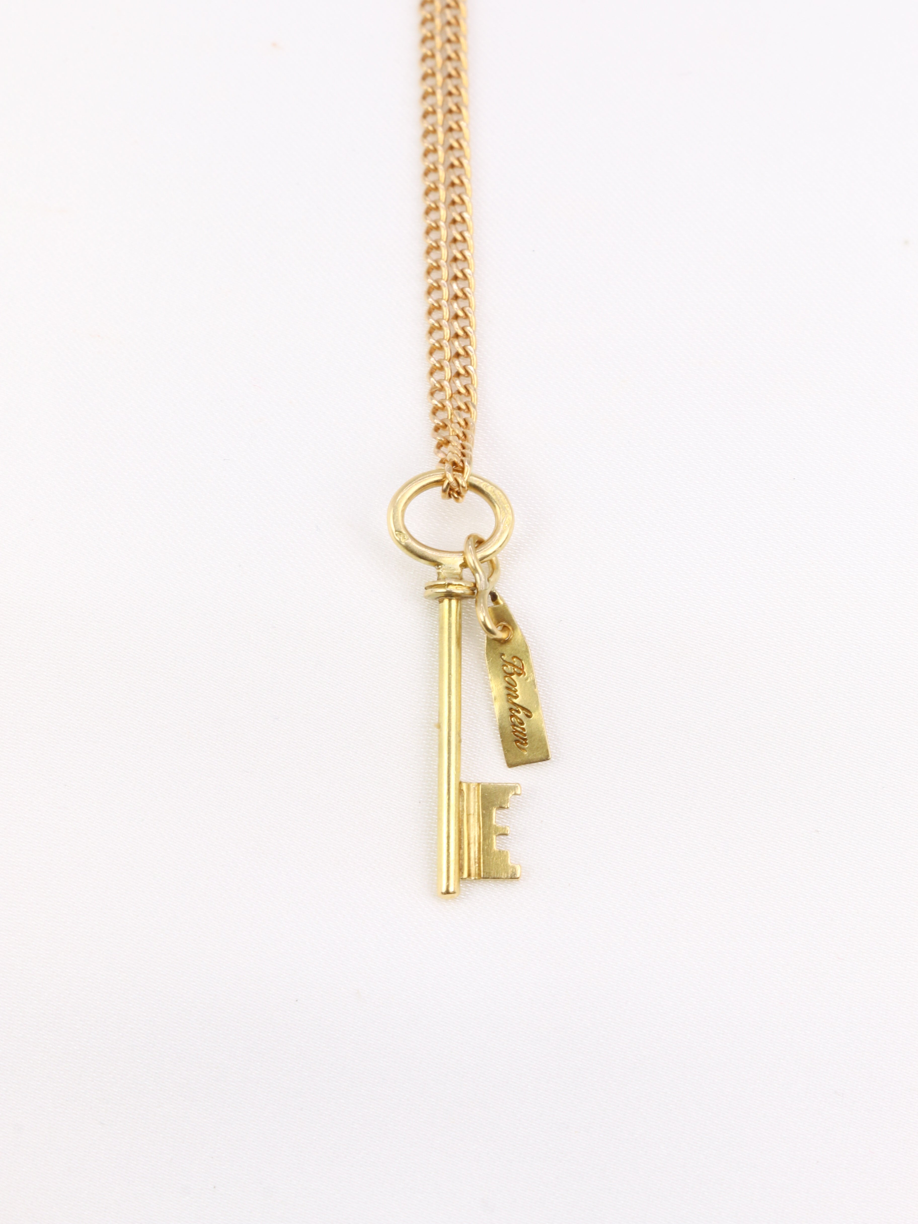 Pendentif porte-bonheur vintage Clé en or