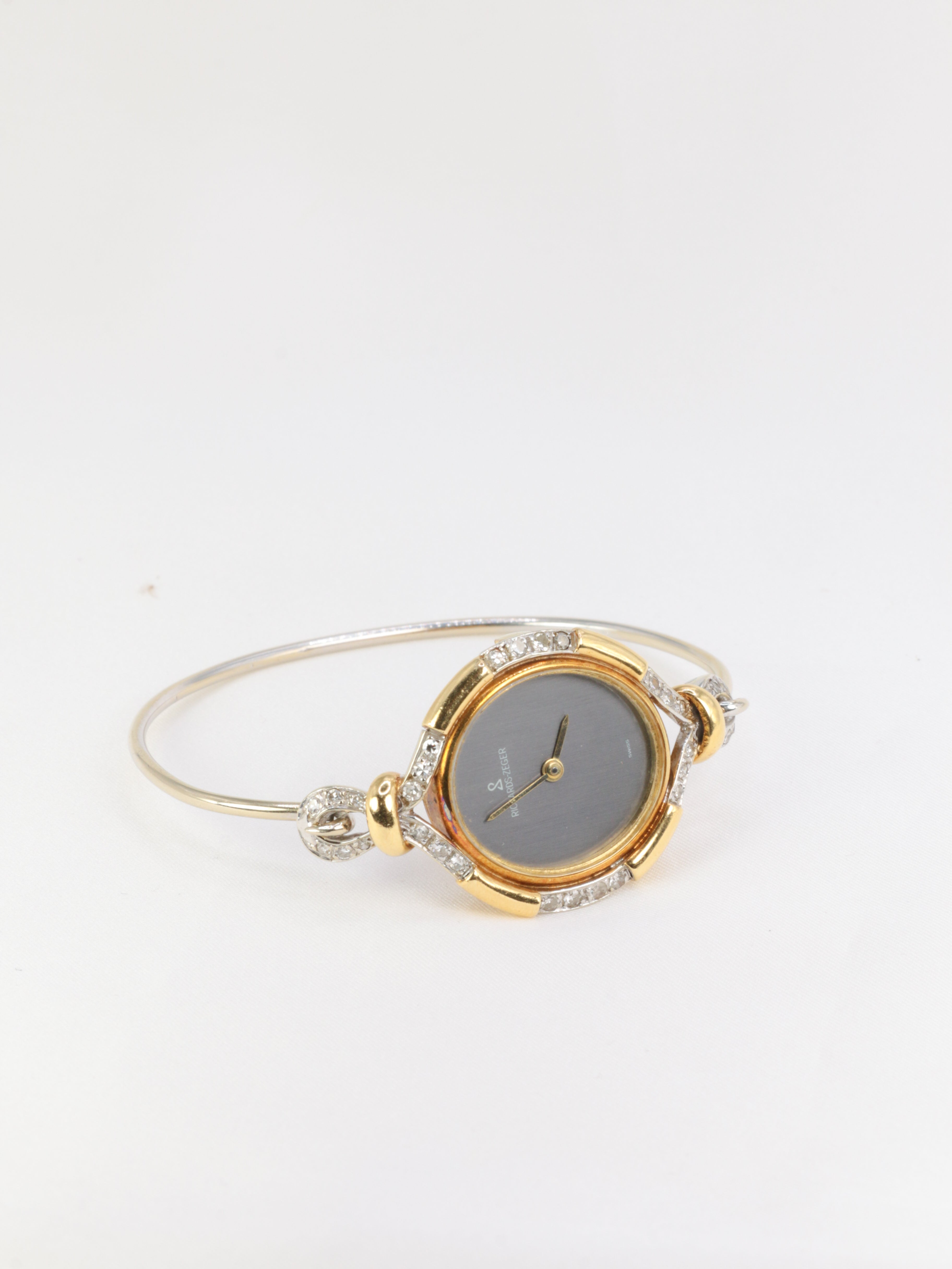 Montre de femme vintage Richards Zeger en or et diamants