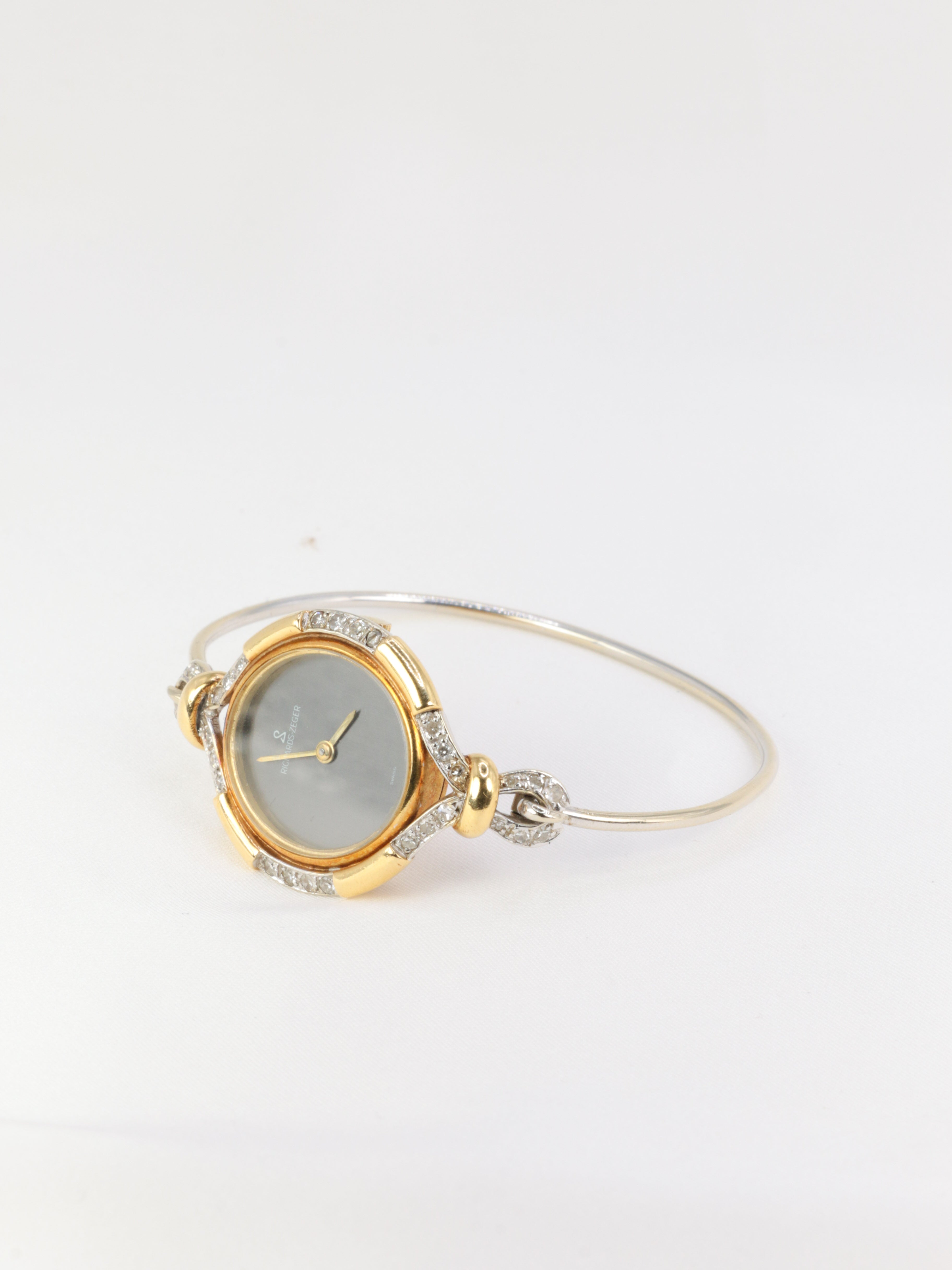 Montre de femme vintage Richards Zeger en or et diamants