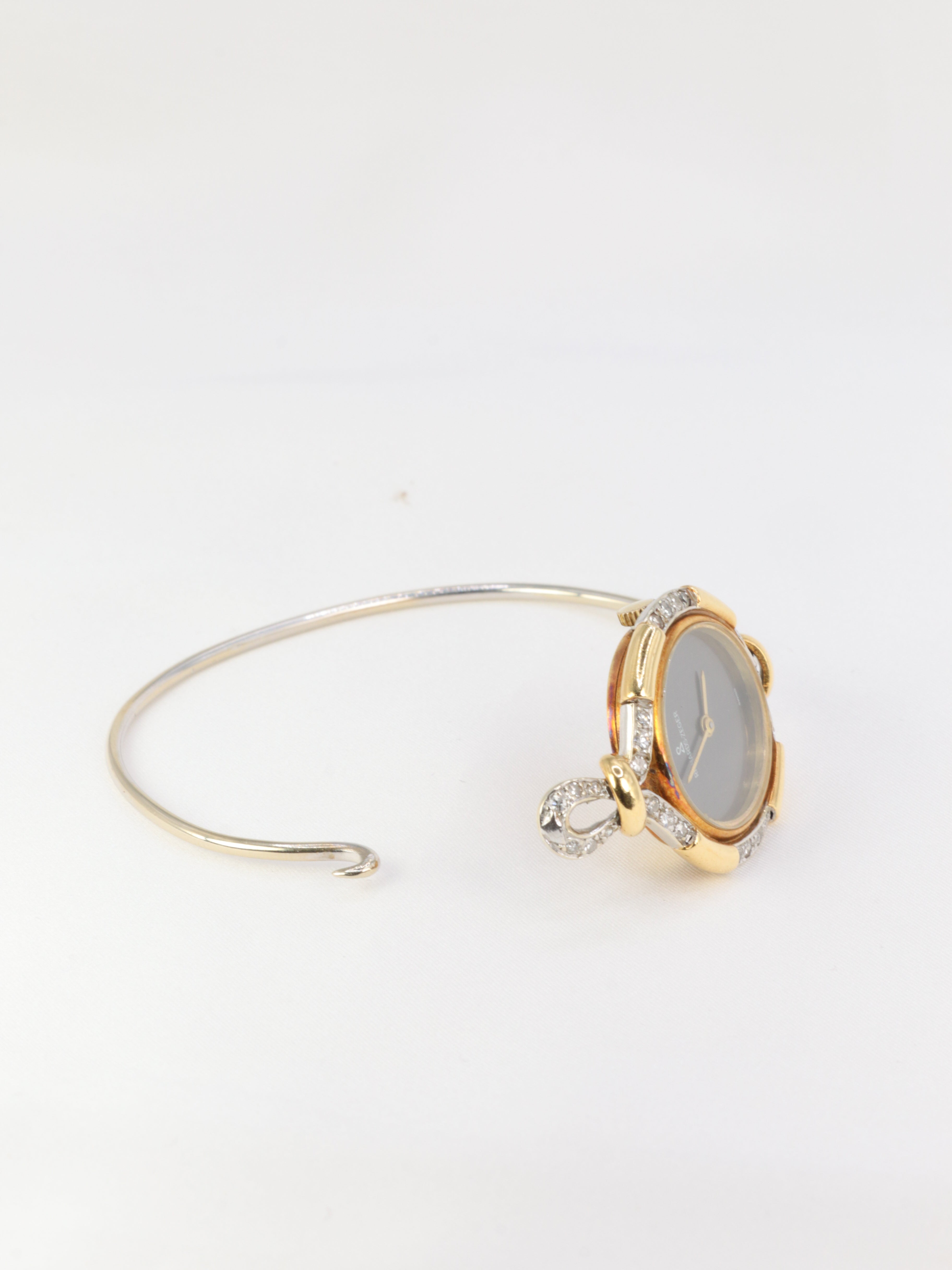 Montre de femme vintage Richards Zeger en or et diamants