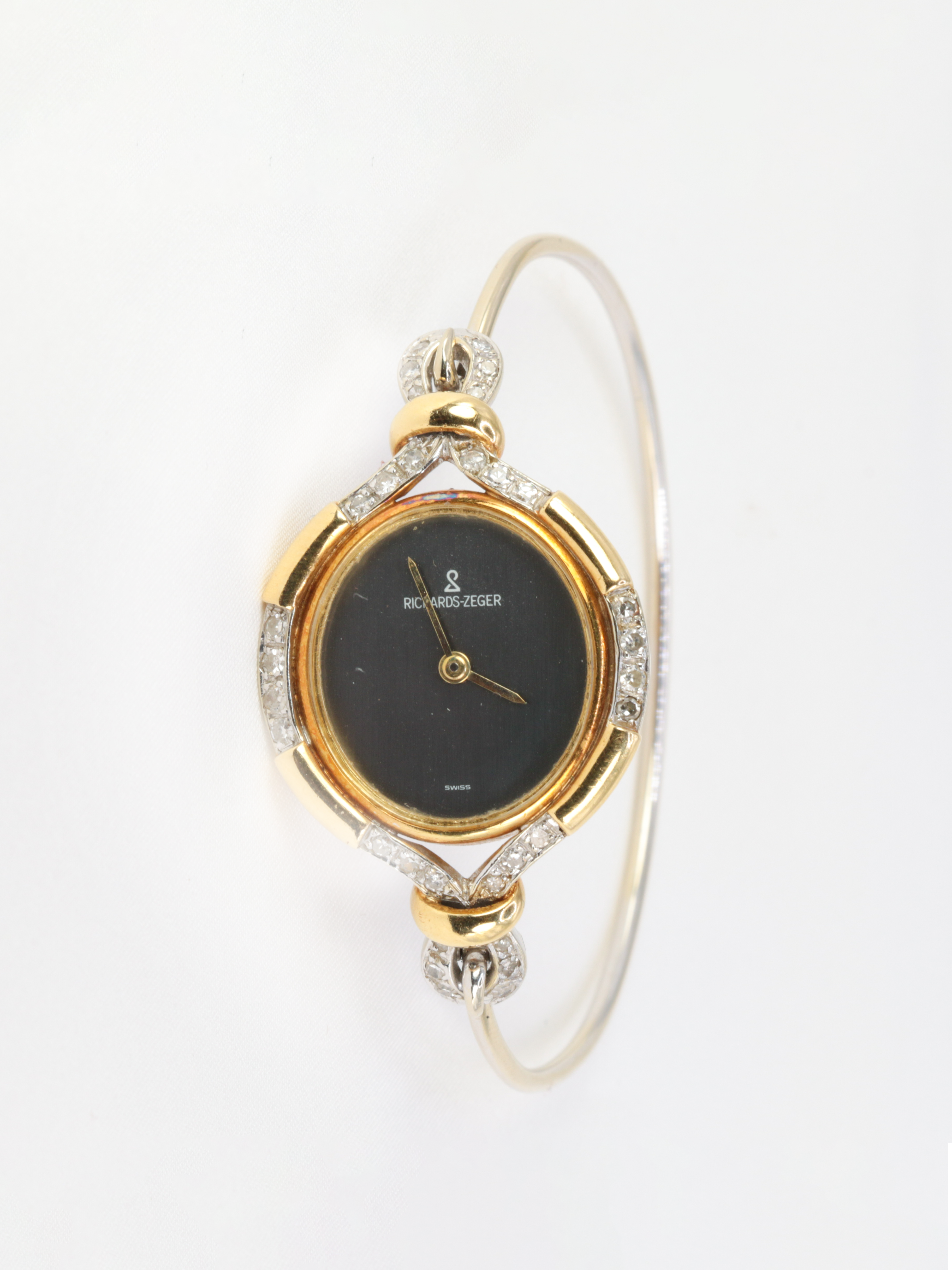 Montre de femme vintage Richards Zeger en or et diamants