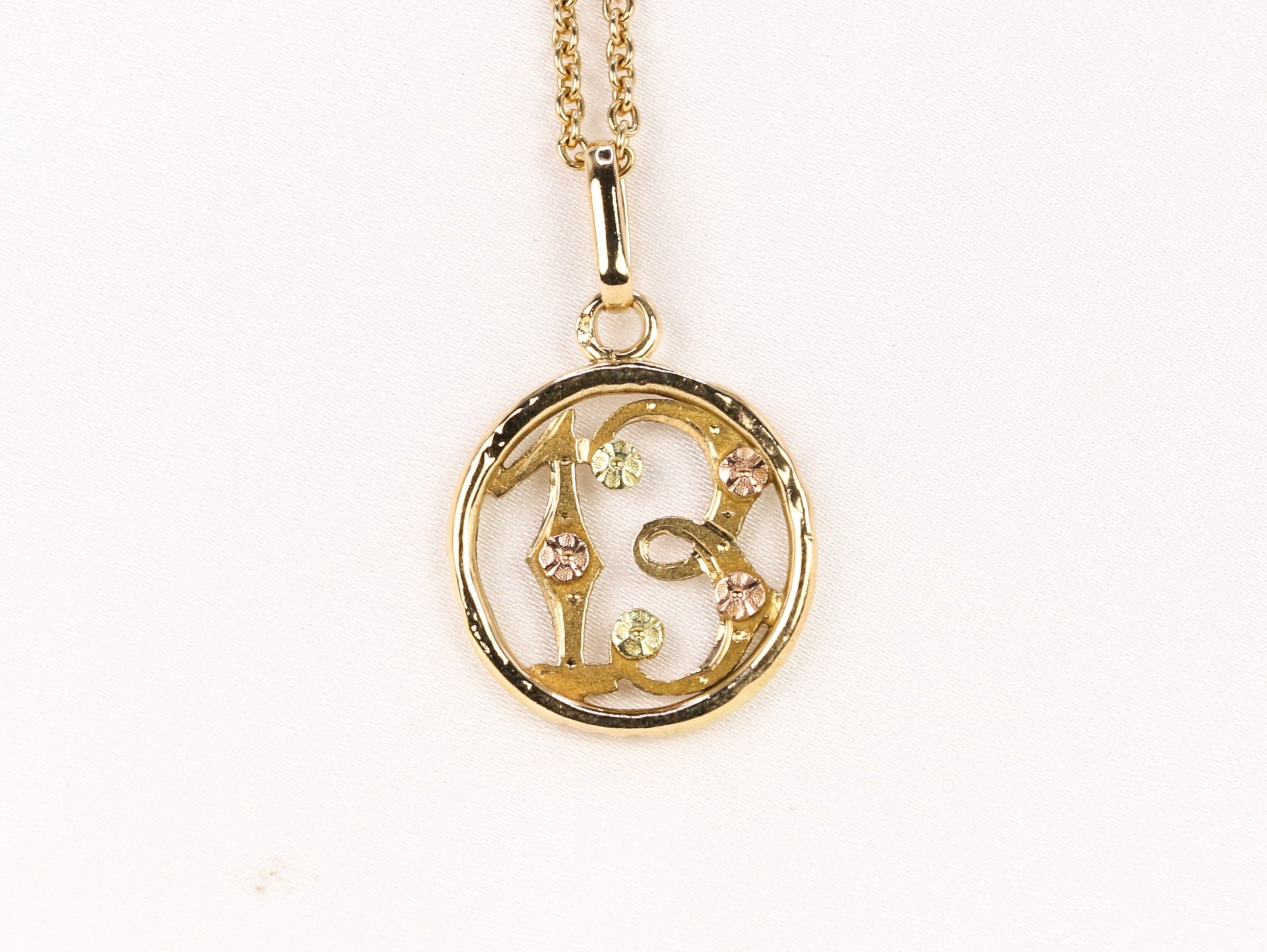 Pendentif vintage porte bonheur en or jaune
