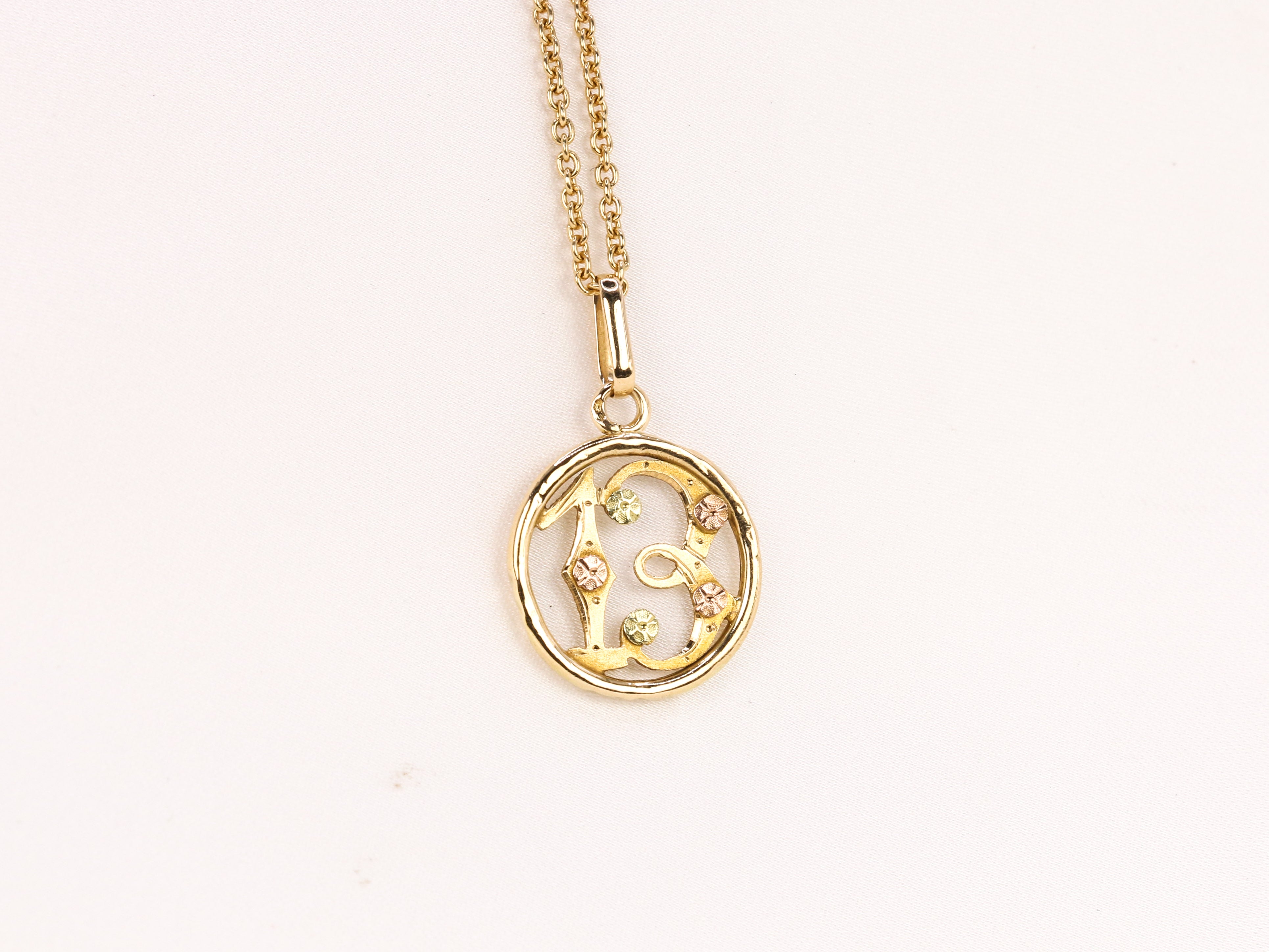 Pendentif vintage porte bonheur en or jaune