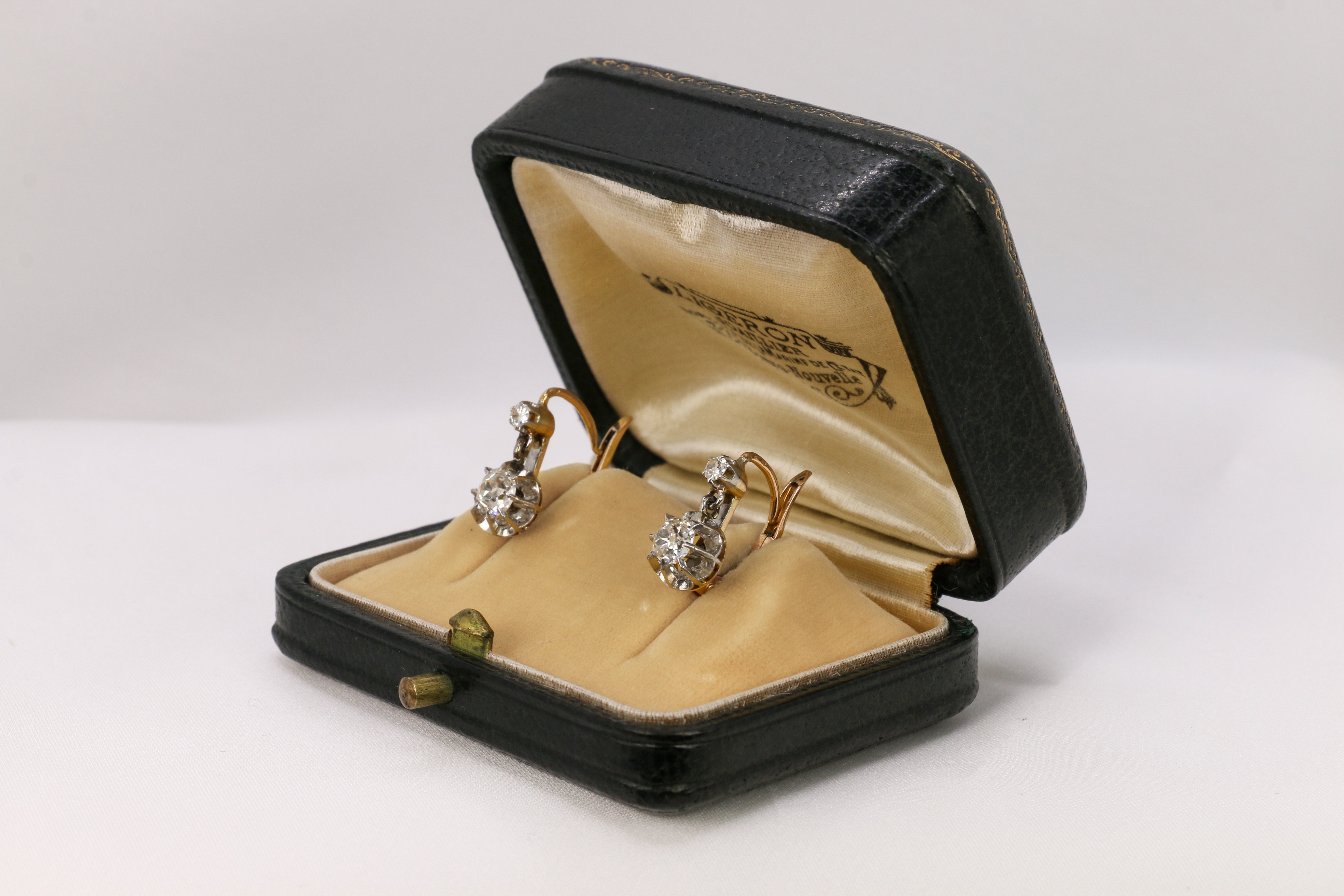 Antique sleeper earrings in gold, silver and old cut diamonds