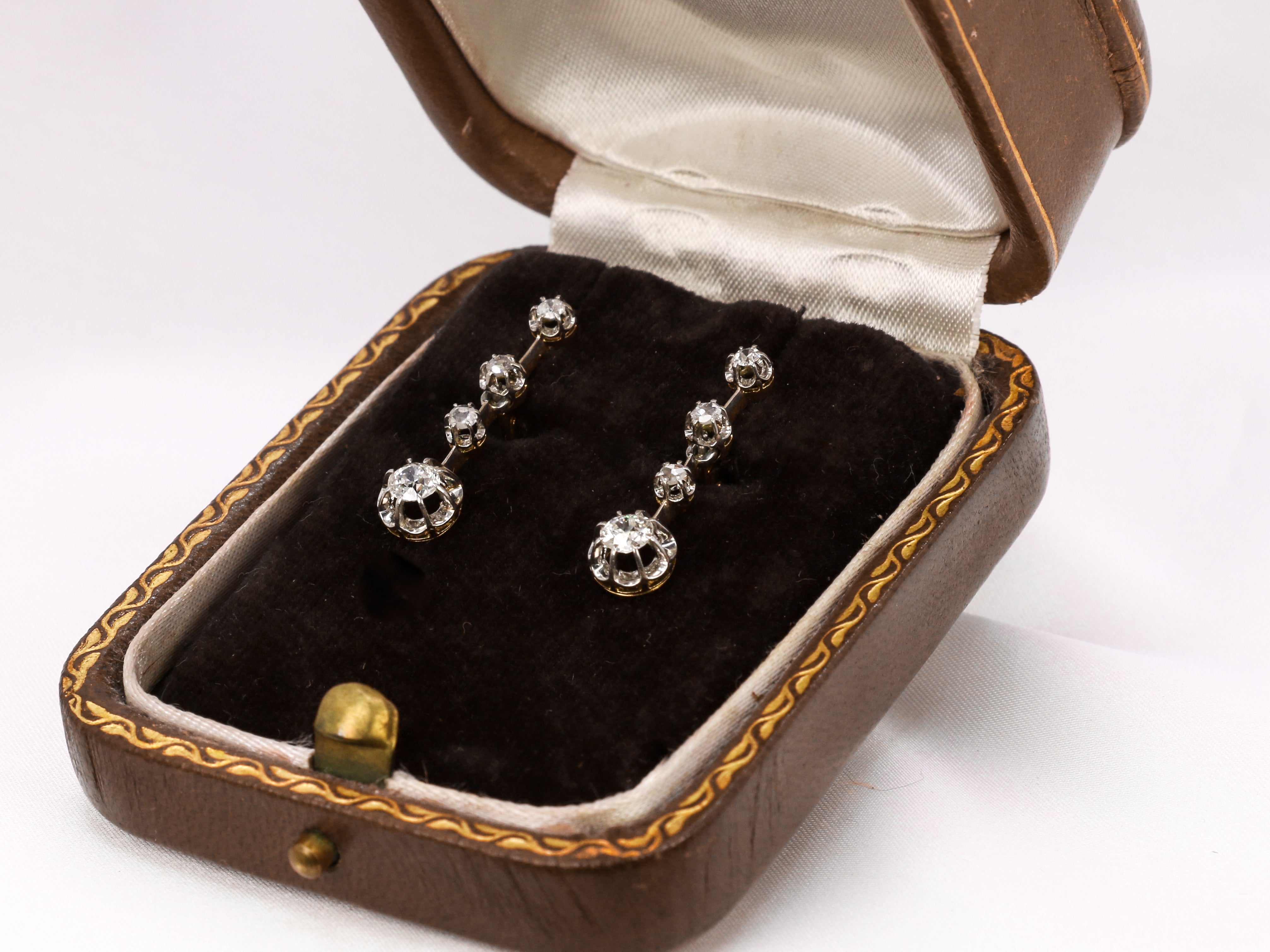 Antique sleeper earrings in gold, silver and old cut diamonds