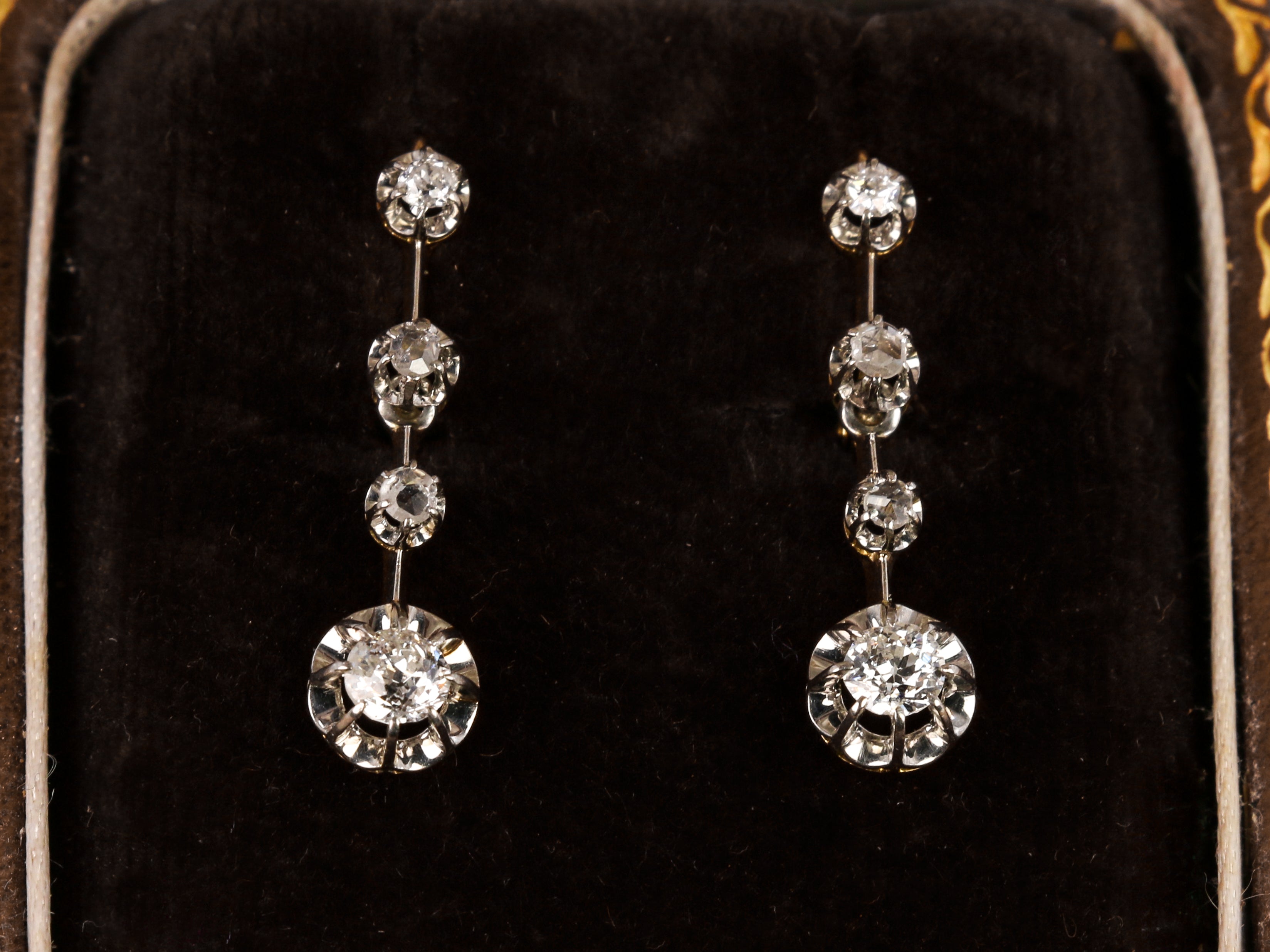 Antique sleeper earrings in gold, silver and old cut diamonds
