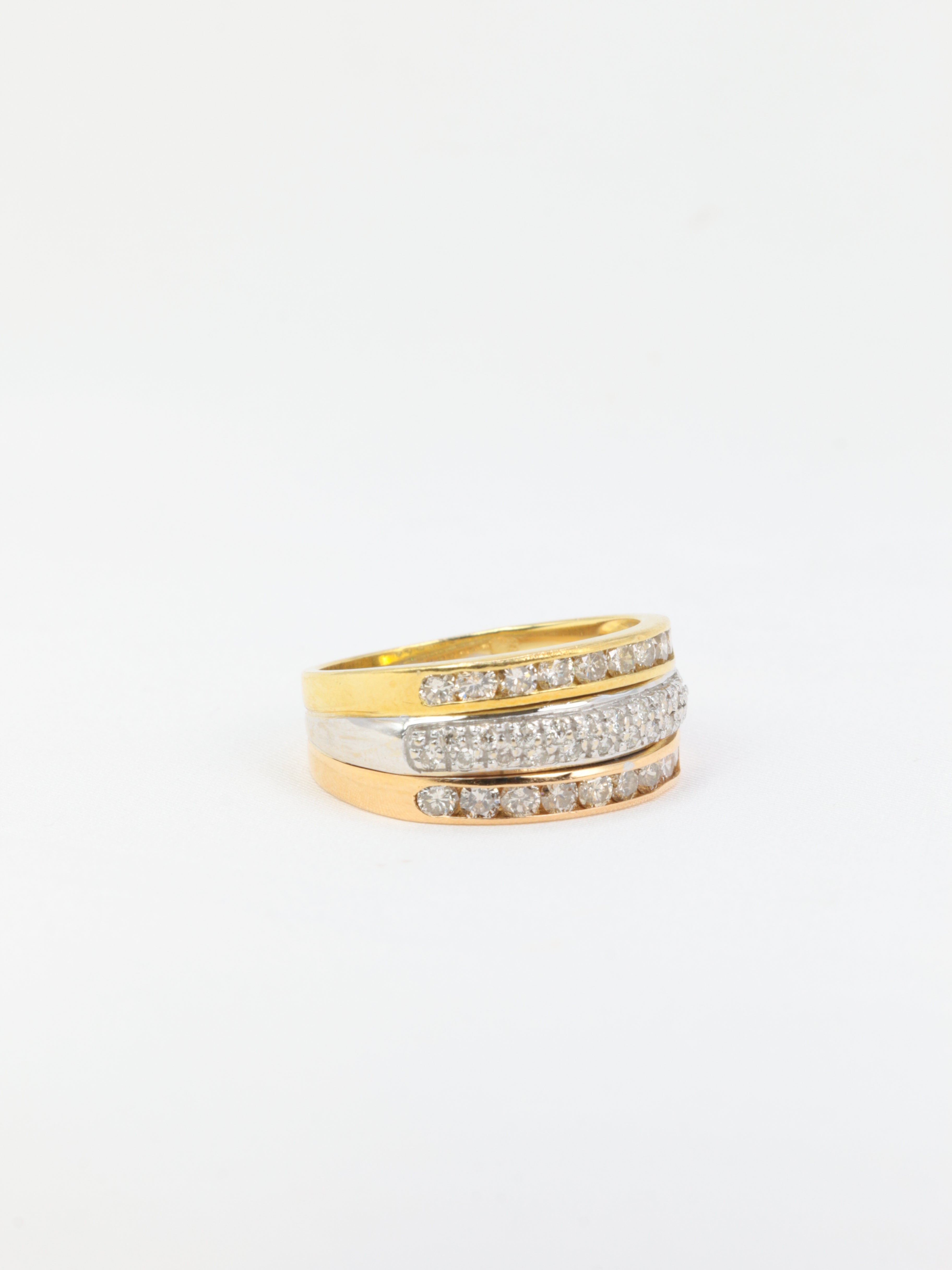 Vintage three gold and diamond ring