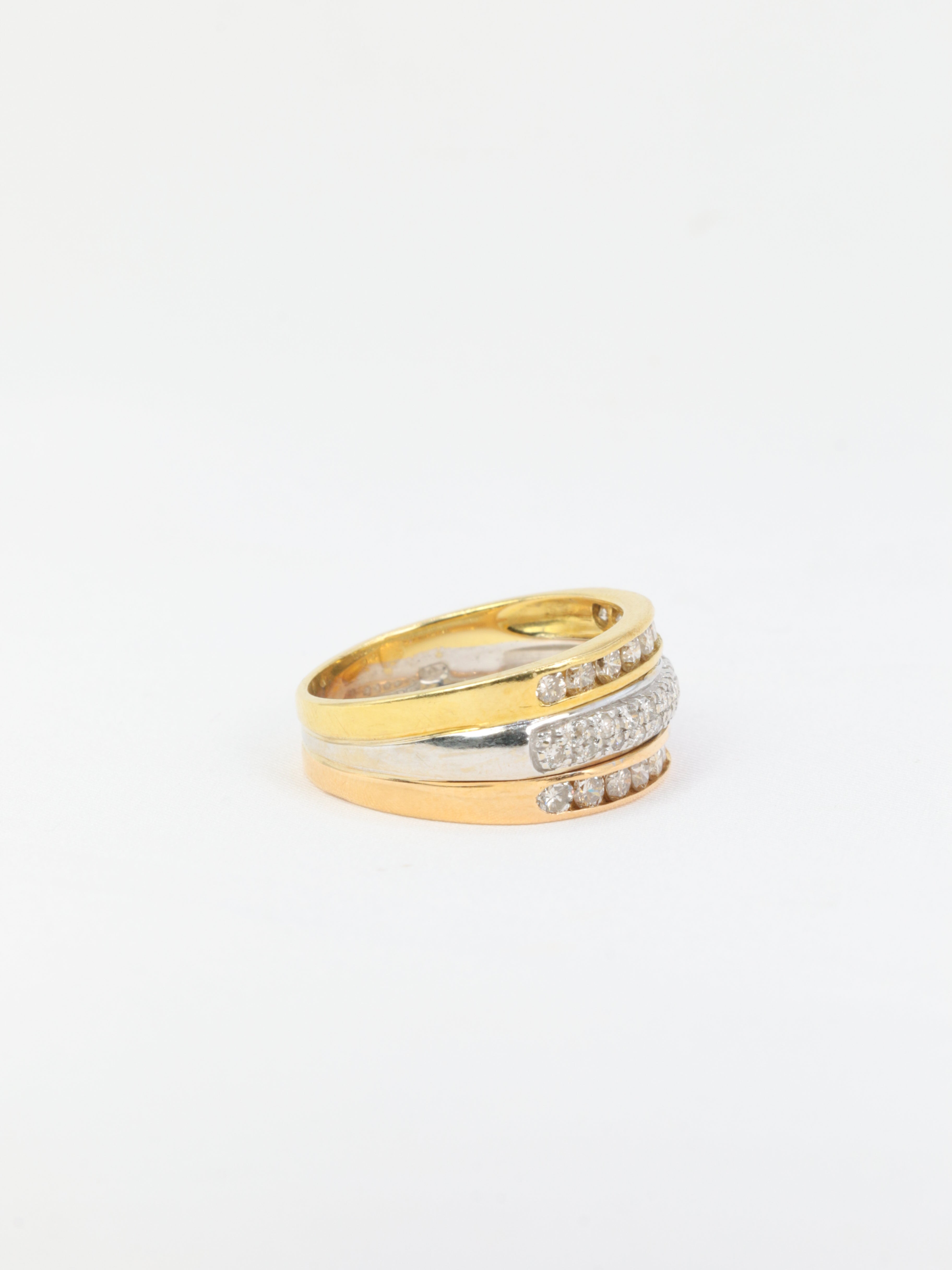 Vintage three gold and diamond ring