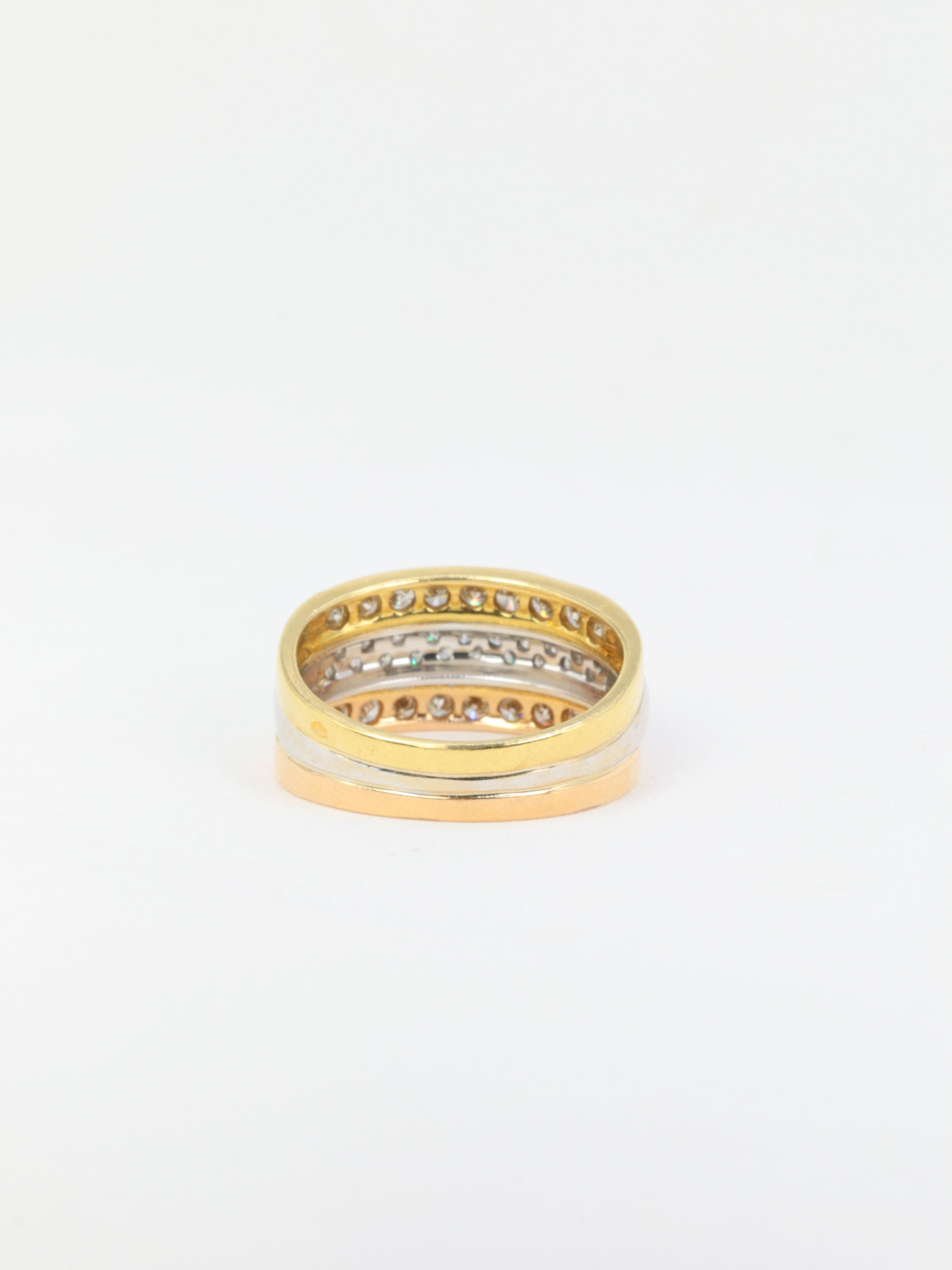 Vintage three gold and diamond ring