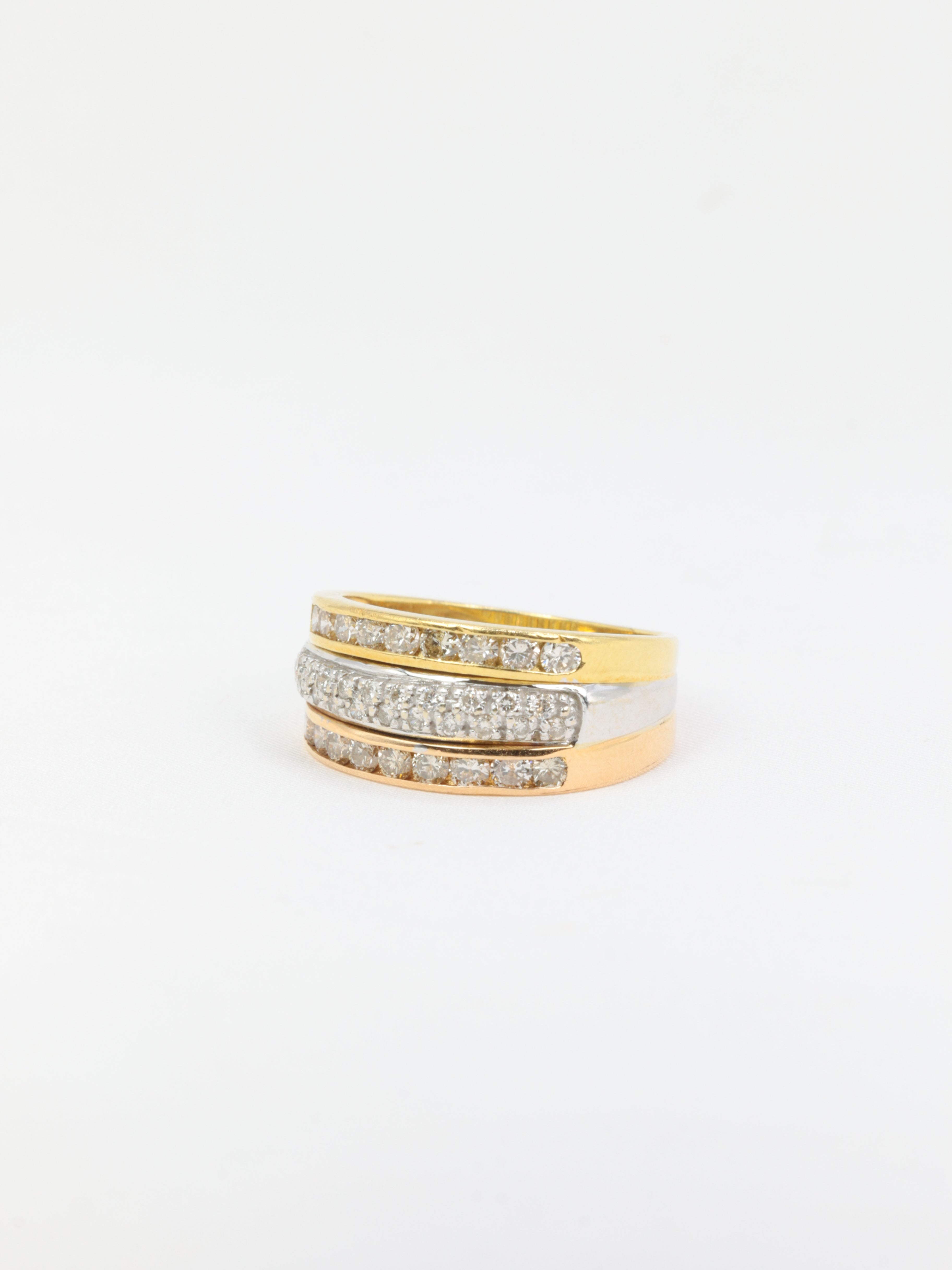 Vintage three gold and diamond ring