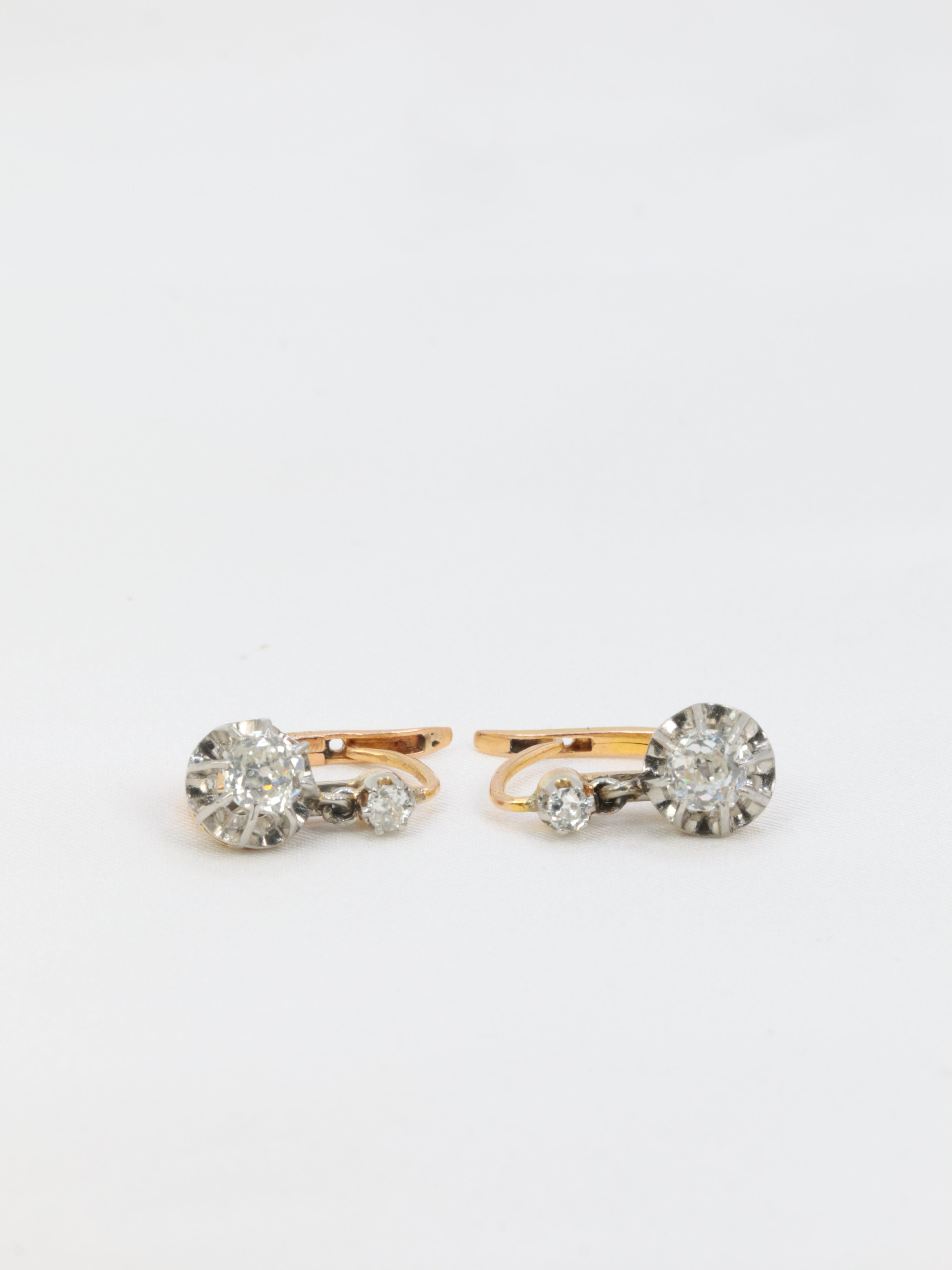Antique sleeper earrings in gold, silver and old cut diamonds